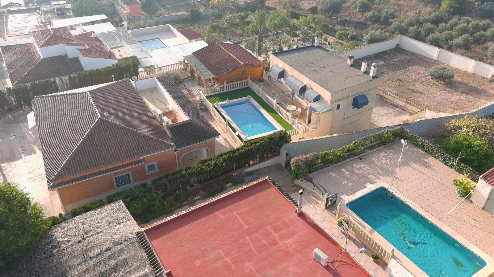 4 bedrooms property in the main house and a separate wooden casita with lounge, extra 3 bedrooms and bathroom. There is also an extra outbuilding with terrace, kitchen, lounge, bathroom, this could certainly be an extra guest room! A storage room/garage is also available.This property is situated on a plot of 2000m2 with more than 300m2 of living space with a spacious private swimming pool.This property is located in the countryside of AlbateraThe town of Albatera has amenities which include a 24 hour health centre, well equipped gym and new indoor pool, shops and supermarkets, there is a weekly market in the town itself and schools for all ages just 5 minutes away.There is also a bus that runs through the town to the British School of Alicante. Just less then 10 m away from Crevillente, 15 m to Elche and 25 m to the airport and 30 to the coast and the main town of Alicante and Murcia.Are you looking for an original rustic property totally reformed with lots of character and fabulous views with more potential for a large family and with neighbours but private then is a perfect choice. You can also have all your family and friends around but can keep you own space as you have 3 different builings in the same plot. You can also use one or 2 building to rent out for holiday maker.