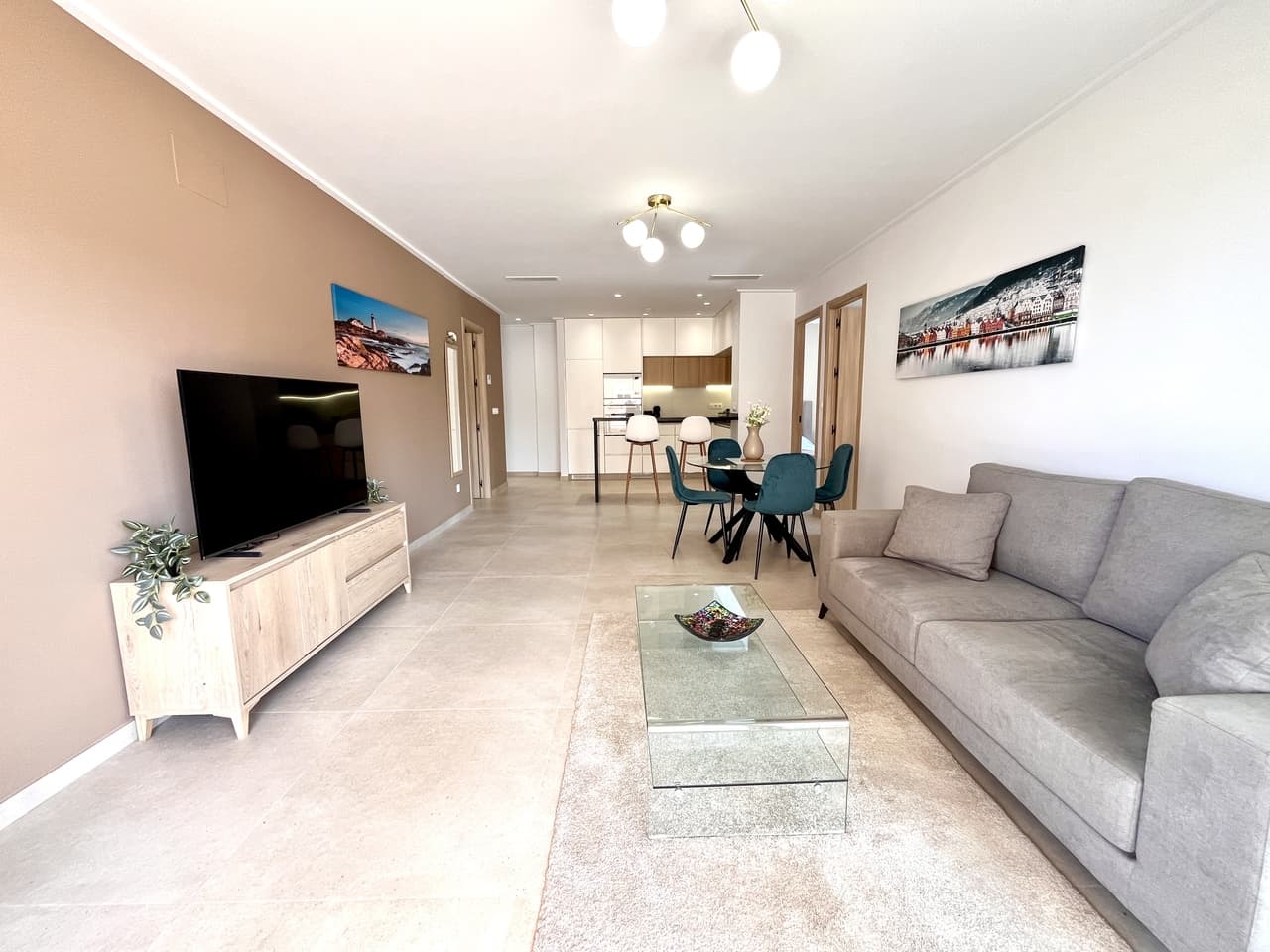 This beautiful 3-bedroom, 2-bathroom apartment in the sought-after Residencial Vista Azul XXXII, El Raso, is an opportunity not to be missed. Perfectly located in the charming area of Guardamar, right next to the well-known Lagunas Park in La Mata, it offers the ideal combination of modern living, comfort, and convenience. Fully furnished and finished to a high standard, it features a bright open-plan living and dining area, a stylish kitchen, and spacious bedrooms. The master bedroom benefits from its own en-suite bathroom for added privacy and convenience. The property is also equipped with electric blinds throughout, adding a modern touch and extra comfort.Set within a fantastic gated community, the property boasts a communal pool, indoor heated pool, children’s playground, and a putting area, providing everything you need for both year-round living or unforgettable holidays. From the apartment, you can enjoy outstanding views across the nearby salt lakes, creating a peaceful and scenic backdrop, perfect for relaxing sunsets and nature lovers. A private garage space is included, and it’s located just 11km from the beautiful sandy beaches of Guardamar, with Alicante Airport only a 25-minute drive away. An exceptional, ready-to-move-in home in the sun, surrounded by nature, views, and excellent local amenities.