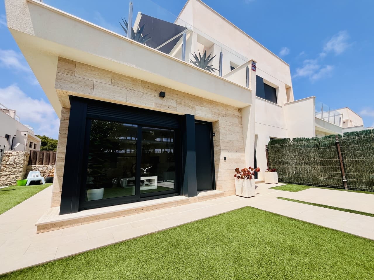 Discover your dream home by the sea! This beautifully presented 3 bedroom, 2 bathroom semi-detached villa is located just 250 metres from the stunning Higuericas Beach, in a sought-after area close to all amenities. Fully furnished and thoughtfully designed, the property offers a bright and open living space, with large windows filling the home with natural light.The villa boasts three genA fantastic opportunity to own this beautifully presented 3 bedroom, 2 bathroom semi-detached villa just 250 metres from the stunning Higuericas Beach in Torre de la Horadada. Ideally located close to the charming town of Pilar de la Horadada, where you can enjoy traditional weekly markets, lively plazas, and authentic Spanish restaurants.This bright, modern home features a spacious open-plan living and kitchen area, fully furnished and ready to move into. Large windows fill the villa with natural light, creating a warm and inviting atmosphere throughout.Comprising three generous bedrooms and two modern bathrooms, this property also offers a private solarium, the perfect space to relax in the sun, enjoy alfresco dining, or entertain guests while soaking up the Mediterranean breeze.Located in a quiet residential area with excellent access to local amenities, the famous San Pedro promenade, salta lakes, natural parks, golf courses, and La Zenia Boulevard are all within a short drive.An ideal option for a holiday home, full-time residence, or rental investment in one of the Costa Blanca’s most sought-after beachside locations.rously sized bedrooms, two modern bathrooms, and a sleek open-plan kitchen and living area perfect for family gatherings or entertaining guests.Step outside to your private rooftop solarium — an incredible space to unwind, enjoy the Mediterranean sun, or host a barbecue as the sea breeze drifts by.Whether you're searching for a perfect holiday retreat, smart rental investment, or full-time coastal home, this property delivers on every front