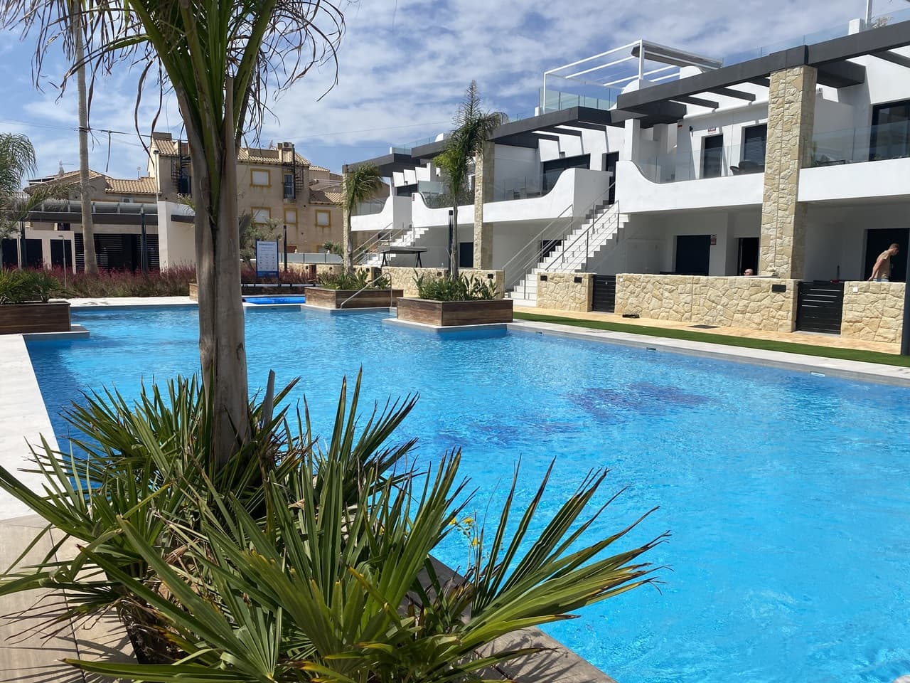 Exclusive Opportunity at Innova Beach I - Punta Prima Welcome to your dream home in one of Orihuela Costa's most sought-after developments — Innova Beach I! This is a rare chance to secure a brand new, ground floor, private corner plot, modern deluxe 3-bedroom, 2-bathroom property in a completely sold-out community.Key Features: Ground Floor Luxury: Enjoy effortless living with seamless access to your private oasis.Expansive Outdoor Space: Sitting on a generous 300m² plot with a stunning 200m² private garden — perfect for entertaining, relaxing, or soaking up the Mediterranean sun and with space to build your very own private pool.Resort-Style Amenities:Beautiful swimming pools for residentsHeated jacuzzi for year-round relaxationChildren’s playground to keep little ones happyOutdoor gym to stay active in the sunProperty Highlights:Three spacious bedrooms with built-in wardrobesTwo modern bathrooms with high-end finishesOpen-plan living and dining area filled with natural lightFully fitted contemporary kitchenPrivate parking includedPremium fixtures and stylish, modern design throughoutLocation, Location, Location:Punta Prima is known for its vibrant atmosphere, golden beaches, and incredible range of restaurants, bars, and shopping facilities — all just minutes away. Plus, you're close to golf courses, international schools, and excellent transport links.This is the second largest property in the entire complex — a true gem and an unbeatable investment or lifestyle purchase.Don't miss out — properties like this at Innova Beach I don't come back on the market often!Contact us today for more details or to arrange your private viewing!