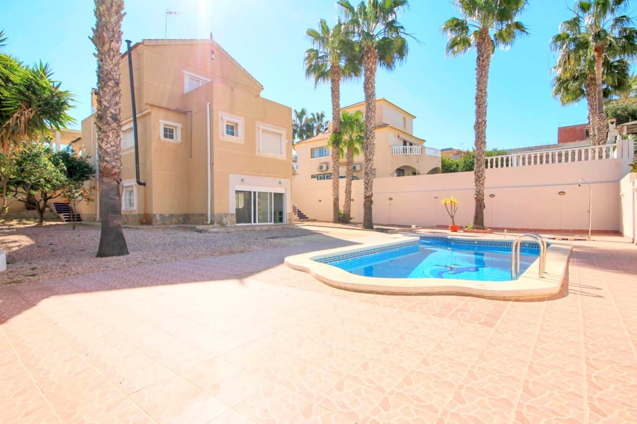 A very large detached villa situated in the popular location of La Zenia, close to all local facilities and amenities and within a short stroll of La Zenia beach and Boulevard.The property is approached by electric gates leading to the driveway. There are 5 bedrooms and 3 bathrooms. Downstairs the area is open plan which is very large and has large patio doors opening to the terrace and private pool. This is a really spectacular property offering huge accommodation situated on a plot of approximately 700M2.