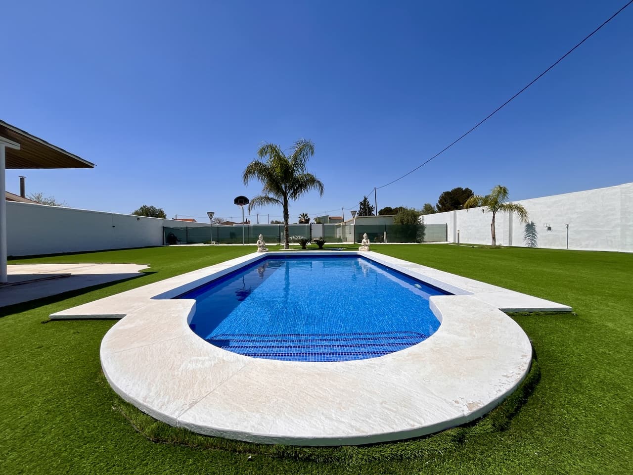 This stunning country home, built in 2020, is set on a generous 2,000m² plot just a stone’s throw from the lovely town of Alcantarilla. With 3 spacious bedrooms and 3 bathrooms, including a master bedroom with its own private en-suite, this property offers the perfect blend of comfort, space, and style. Inside, you'll find a cozy fireplace, air conditioning for year-round comfort, and a fully filtered water system throughout the home. The open and inviting layout is filled with natural light, creating a warm and welcoming atmosphere.Outside, the property boasts a newly built 10x4 swimming pool complete with a pool heater, allowing you to enjoy a swim all year round. The large driveway fits up to 8 cars, and there’s a fantastic chillout area perfect for relaxing or entertaining. The fully fitted outdoor kitchen with BBQ and oven makes al fresco dining a real pleasure. External stairs lead to a spacious solarium with breathtaking mountain views, offering potential to convert into additional living space or simply to soak in the tranquil surroundings.For added peace of mind, the house is equipped with full security cameras around the property, ensuring you feel safe and secure at all times.Located within walking distance to the popular Restaurante "El Pedrusco", known for its traditional Murcian dishes, and only a short drive into Alcantarilla town, where you’ll find everything you need from shops, bars, restaurants, and schools to hospitals and other essential services. And if you're dreaming of the coast, the beautiful beaches of the Mar Menor are just a 20-minute drive away, making this property a perfect blend of peaceful country living with excellent access to town and sea.Whether you’re looking for a full-time residence, a holiday home, or a fantastic investment, this countryside gem truly ticks all the boxes.