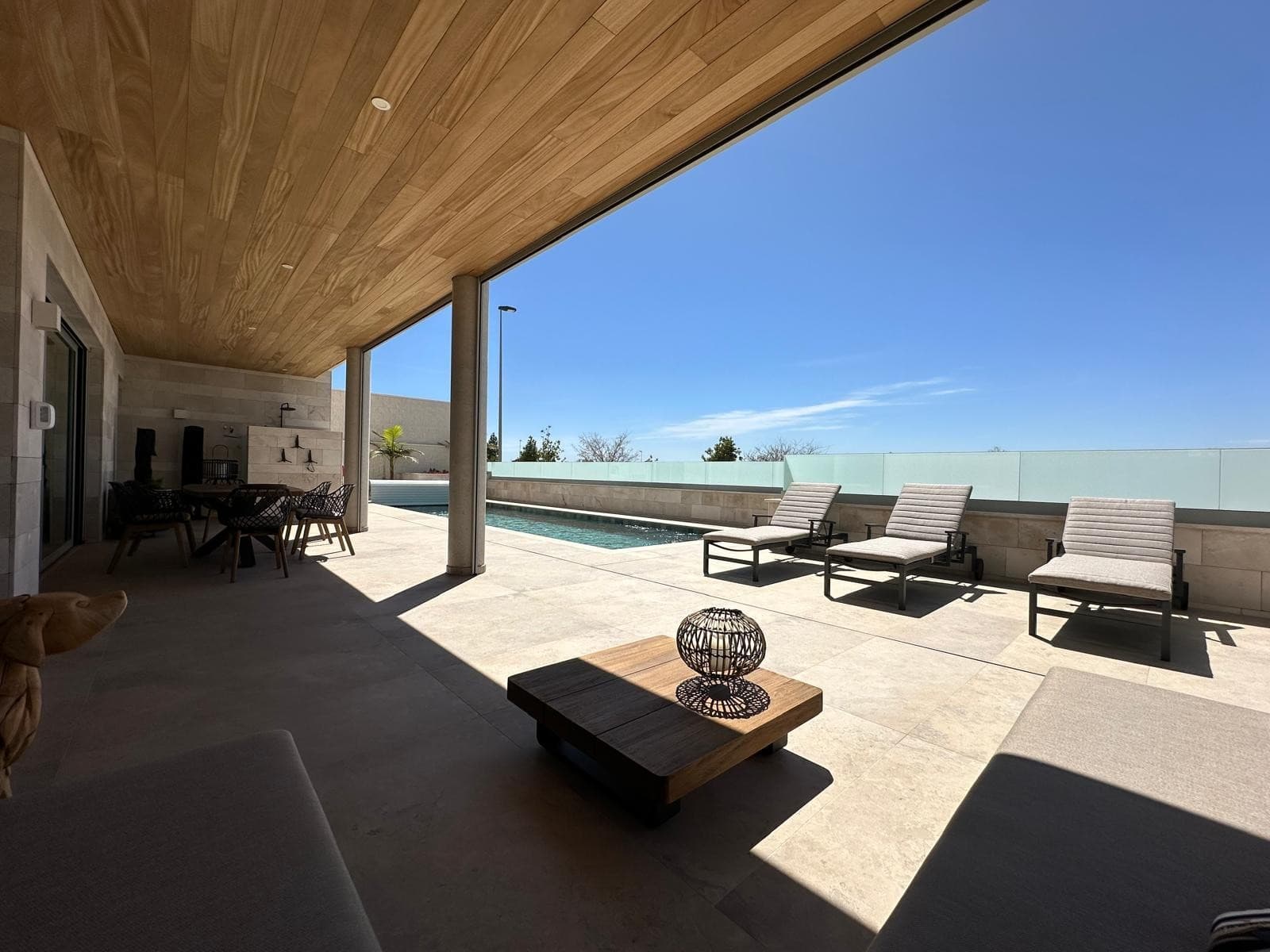 This is not just another villa. This is an extraordinary creation, built with vision, craftsmanship and uncompromising quality. A rare opportunity to invest in a residence that embodies luxury, sustainability, and exclusivity in every detail.Built on an innovative foundation and equipped with highly efficient insulation (IKO Enertherm Alu TG, specially imported), this villa sets new standards in energy efficiency and comfort. Advanced solar energy systems with storage capacity ensure that energy costs remain minimal – a rare advantage for a property of this scale.Every detail radiates quality: from the fully electric shutters and sunshades to the state-of-the-art heating system and the modern water purification installation providing pure drinking water throughout the entire villa. All finishes – from flooring to woodwork and sanitary ware – have been meticulously selected and perfectly matched, resulting in aesthetics that exude pure class.Layout & Living Spaces 4 spacious bedrooms,   each with its own luxury en-suite bathroom, including an exclusive master   suite with direct access to the pool A spectacular 57   m² solarium with breathtaking panoramic views – the perfect setting   for elegant gatherings or unforgettable sunsets A beautifully   designed terrace of 176 m² in total, including a large, elegantly   tiled 11 x 4 metre swimming pool. Of this, 46.3 m² is covered   and can be fully enclosed with stylish, high-quality screens – ideal for   year-round comfort and privacy On the side of the   villa, an additional 80 m² garden with lush Mediterranean   landscaping provides extra atmosphere and exclusivity An impressive living   area with floor-to-ceiling sliding doors seamlessly connecting indoor and   outdoor spacesThe spacious basement offers a garage for multiple cars, the option of a home cinema, gym or guest suite – the possibilities are endless.Why this villa is uniqueWhere similar villas in other prime locations would cost double or even triple, this residence in Benijófar offers unmatched investment potential. More than a home – this is a statement, a lifestyle, and a secure investment for the future.