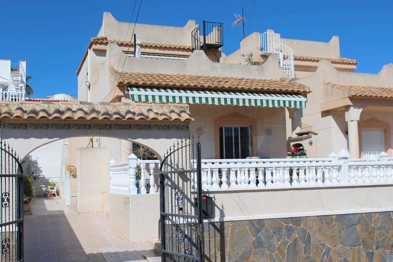 "READY TO MOVE IN" This wonderful 103m2 detached VILLA with 3 bedrooms, 2 bathrooms is located in BLUE LAGOON, SAN MIGUEL DE SALINAS on a plot of 200m2 with a private12m2 pool and various sunny terraces. On the ground floor there are 2 double-sized bedrooms, 1 renovated bathroom, an open plan fully equipped kitchen, a large living/dining room and a storage room. Entering through a staircase from the outside you will find on the 1st floor a separate spacious studio flat with a bedroom, separate shower room, kitchenette and a living room which leads out to a large terrace area with a BBQ and beautiful views! On the 2nd floor is another large roof terrace with a solar panel for hot water and an amazing view of the sea and salt lakes! The property is situated in a very quiet area with sun all around the house and is in walking distance to all amenities, supermarkets (Mercadona and Aldi), restaurants and bars, new public pool, “Green Lands ”, Minigolf, El Limonar - International School and the popular Villamartin PLAZA and La Fuente commercial centre is very near. The beautiful beaches of Orihuela Costa only 4km away and the famous shopping centre Zenia Boulevard with over 150 shops, bars and restaurants is only a few minutes’ drive by car.Many extras include; electric entrance gate, laundry room, fly screen blinds on ALL windows upstairs and downstairs, 4 air conditioning units hot & cold gas central heating and it is sold fully furnished.  Blue Lagoon is surrounded of the most beautiful golf courses in the area Real Club de Campoamor, Las Ramblas, Villamartin, Las Colinas etc... This is a home to live in all year around and has a very good RENTAL POTENTIAL. Corvera Airport in Murcia and El Altet Airport in Alicante are both 45 minutes’ drive by car.