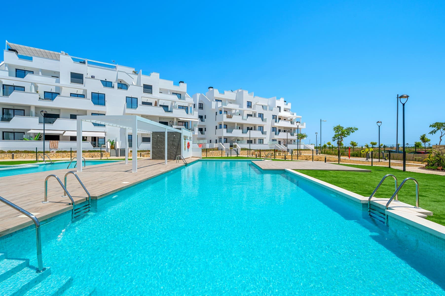 Modern 2-Bedroom Apartment in Santa Rosalia Lake and Life Resort – A Fast-Growing Paradise for Living and Investment

Discover this brand-new, beautifully finished 2-bedroom, 2-bathroom apartment located in the heart of the highly sought-after Santa Rosalia Lake and Life Resort – one of the fastest-growing lifestyle resorts in the region, ideal for both full-time living and smart investing.

This stylish, west-facing apartment offers bright and airy living spaces with air conditioning throughout for year-round comfort. The open-plan kitchen and living area flow seamlessly onto a spacious private terrace, perfect for enjoying the sunset or relaxing with a view of the pool and the lush resort grounds.

The master bedroom features an en-suite bathroom, while the second bedroom is generously sized and served by a sleek, modern guest bathroom.

Set within a secure, vibrant resort community centered around a stunning crystal-clear lake, Santa Rosalia offers a unique blend of nature, leisure, and convenience. With amenities like walking trails, beach clubs, water sports, and dining, it’s not just a place to live – it’s a way of life.

Whether you're looking for a holiday home, a full-time residence, or a high-potential rental property, this apartment is a smart choice in a location that continues to grow in popularity and value.