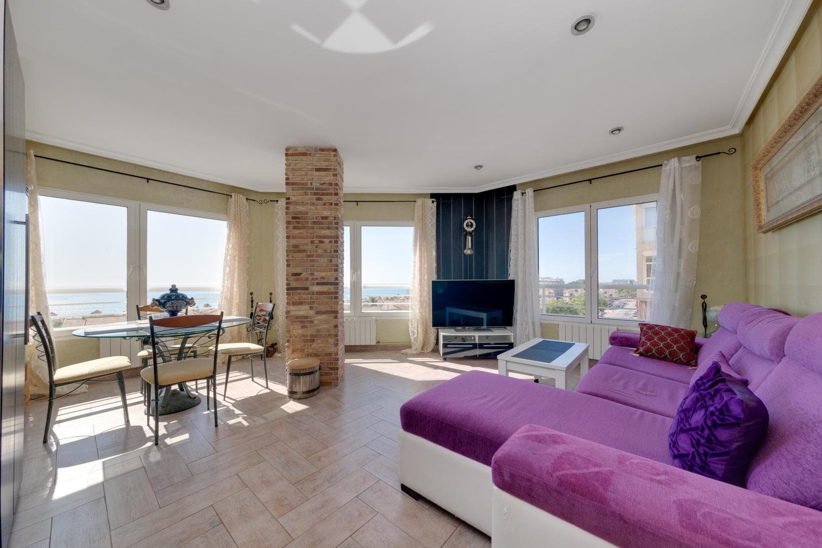 An apartment is for sale on the top floor of a building in Guardamar. The apartment has a total area of 142 m2. On the first floor of the apartment there are two bedrooms, a bathroom, a spacious living room, a separate kitchen equipped with a lift to bring up groceries or cooked dishes to the second floor (terrace). All rooms have a sea view. You can take the stairs to the second floor, where there is a relaxation area in the glazed part of the terrace, with a fireplace installed. The open part of the terrace also offers a stunning sea view, with sun loungers for sunbathing.The apartment has gas heating. The owners of the apartment own a garage in the underground parking, which can be purchased for an additional fee, upon the buyer's request. When buying property in Spain, you can apply for a residence permit. Our company helps to arrange any type of residence permit!