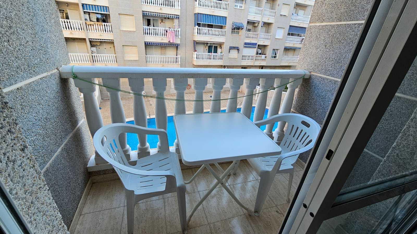 Apartment for sale in Torrevieja on La Loma Street. The property has a total area of 50 m². It offers one bedroom, one bathroom, a living room combined with an open-plan kitchen, and a terrace.The apartment is sold fully furnished and equipped with household appliances, and there is an air conditioner installed. It is located on the 2nd floor of a building with an elevator.The residential complex features a communal swimming pool.All essential amenities are within walking distance, including the bus station, pharmacies, restaurants, and cafés.Online reservation is possible, as well as mortgage financing from a bank at an interest rate of 4–6% per annum.