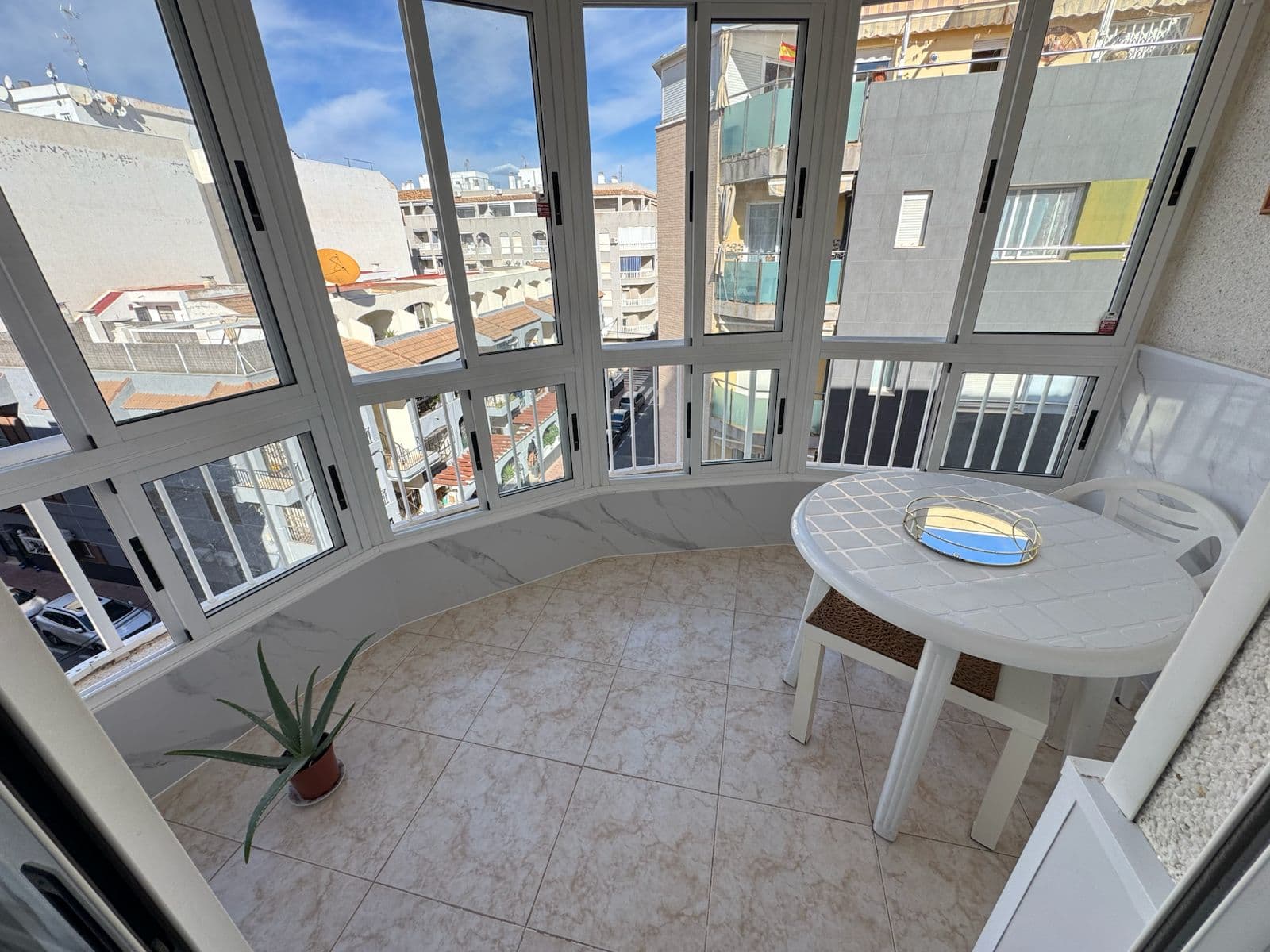 For sale: apartment in Torrevieja, near Acequien beach. The apartment has an area of 86 m2, two bedrooms, one bathroom, a kitchen combined with a living room, and a terrace with a side sea view.The apartment has been renovated, and some furniture has been replaced.The distance to the sea is 150 meters.Within walking distance, there is a well-developed infrastructure - pharmacies, restaurants, cafes, grocery stores, and household shops.The apartment has a tourist license.Torrevieja is a popular Spanish resort town and municipality in the province of Alicante on the southern part of the Costa Blanca coast. The city is considered the third largest in the province after Alicante and Elche. The resort is popular due to its favorable Mediterranean climate, magnificent sandy beaches, and numerous saltwater lagoons around.Online reservation is possible, as well as purchasing on credit from a bank at 4-6% annual interest.