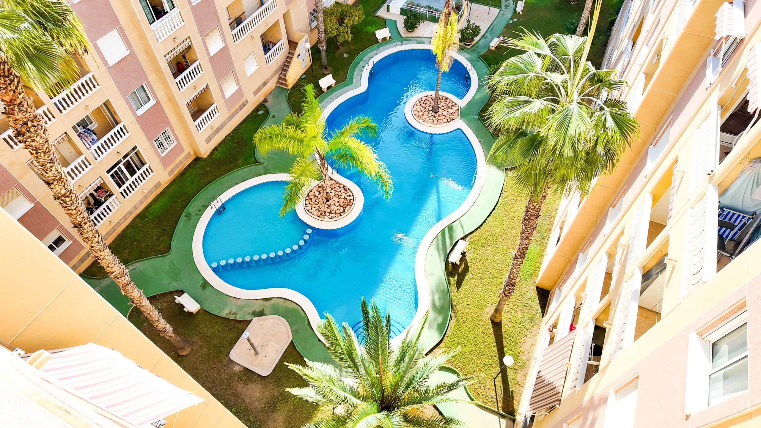 Fully renovated apartment for sale just steps from Parque de las Naciones.The apartment has a total area of 56 m² and offers 2 bedrooms, a bathroom and a terrace. It has undergone a complete designer renovation, and nobody has lived in it since. The property features new windows, plumbing, wiring, flooring, walls, stretch ceilings, etc. There is underfloor heating throughout the apartment, air conditioning, and an electronic lock. The price includes brand-new furniture and household appliances.This is a great home for permanent living, located within walking distance of bars, restaurants, supermarkets and the main square of Torrevieja. The beach is only 800 meters away. The apartment is part of a gated residential complex with a beautifully landscaped communal area. The complex offers children’s and adult swimming pools, green areas and relaxation zones. A lifeguard is on duty by the pool. It is possible to obtain a tourist rental license.Torrevieja is a popular Spanish resort town and municipality in the province of Alicante, in the southern part of the Costa Blanca. It is considered the third largest city in the province after Alicante and Elche. The resort is famous for its pleasant Mediterranean climate, stunning sandy beaches and numerous saltwater lagoons surrounding the area.This property can be purchased with a mortgage from a bank at an annual interest rate of 3–6%.