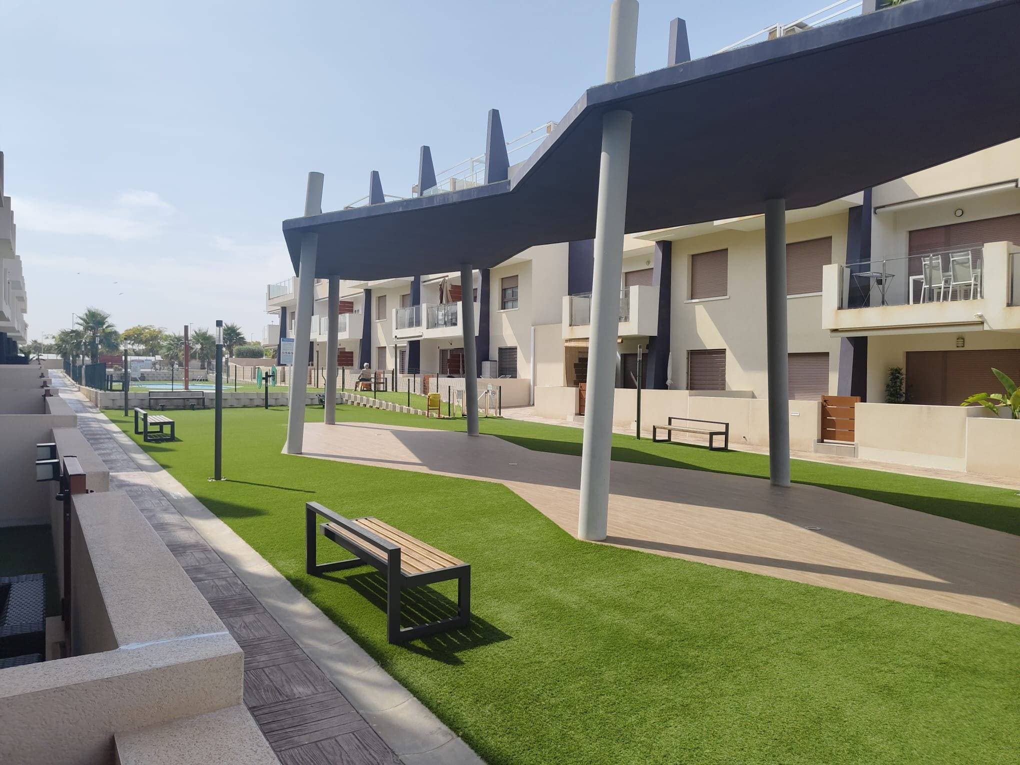 Discover this magnificent 2020 home, fully renovated and furnished, ready to move in. It is a ground-floor bungalow with an elevator, very bright thanks to its north-south orientation, ideal for enjoying the Mediterranean breeze all year round. The property features 2 spacious bedrooms and 2 full bathrooms, as well as two terraces perfect for relaxing or sharing moments with family and friends. It also includes a storage room and garage, providing convenience and extra space for storage. The bungalow offers a high level of comfort with central heating and communal areas designed for enjoyment: a community pool, large gardens, and a playground next to the pool, perfect for families. The location is unbeatable: very close to Mil Palmeras beaches, as well as supermarkets, restaurants, schools, and a health center, making this property a perfect option for both permanent residence and vacations. In short, a modern, bright home with all the comforts in one of the most sought-after areas of the Costa Blanca.