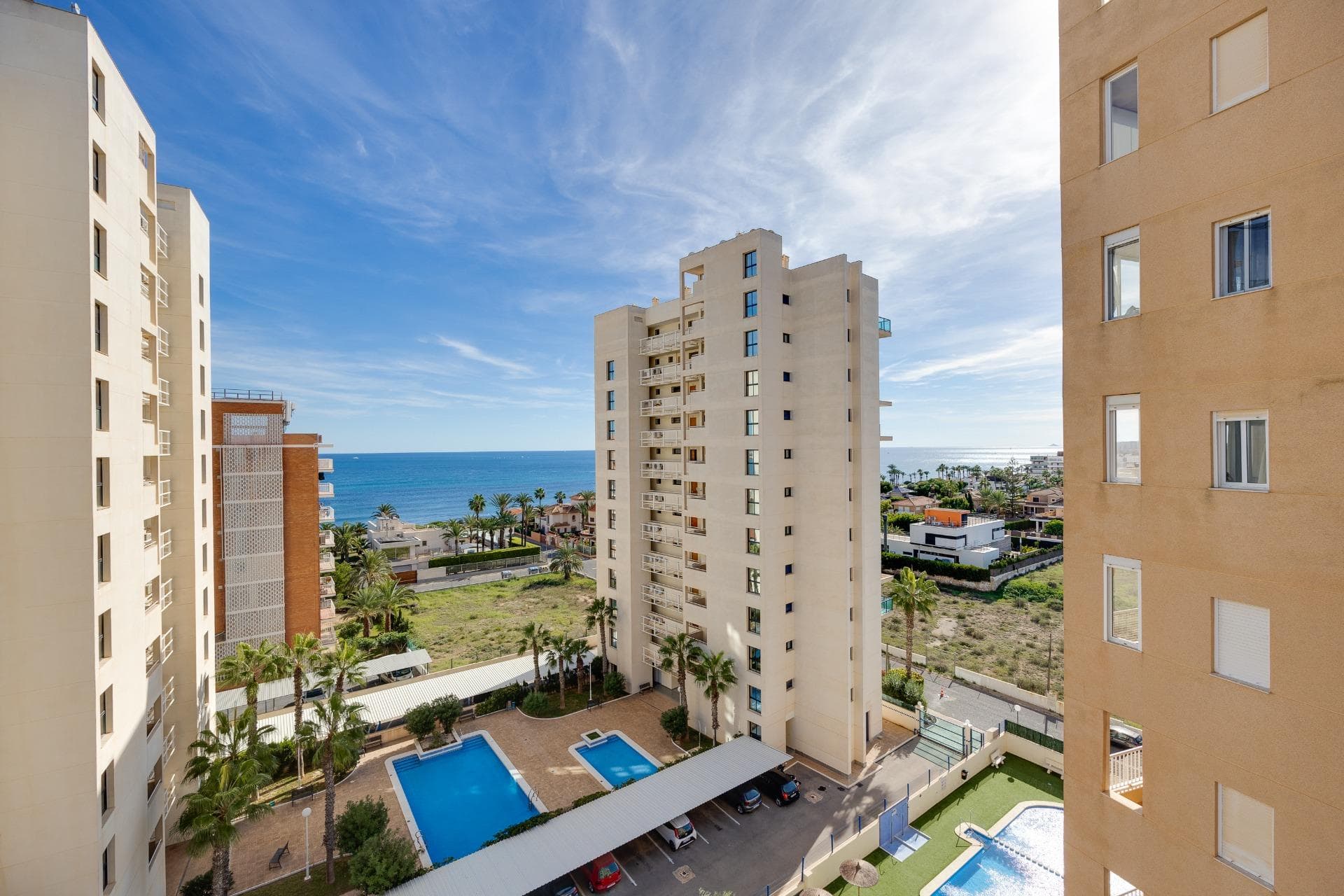 Discover this charming apartment located in the prestigious La Veleta area of ​​Torrevieja, which boasts views of the Mediterranean Sea and the famous Pink Lagoon. With a constructed area of ​​64 m², this property is in excellent condition and ready to move into. Facing east, it enjoys the morning sun from its inviting 10 m² terrace. The property features three double bedrooms, ideal for making efficient use of space, and two full bathrooms that ensure the comfort of its residents. In addition, it boasts a large front terrace and a private entrance hallway that can also be enclosed with glass to create extra living space. Thanks to its location and this layout, you won't need to use air conditioning on summer days. Located just 250 meters from the Mediterranean Sea, you can easily enjoy sunny days by the beach. Furthermore, it is part of a complex that offers a communal swimming pool and landscaped gardens perfect for relaxation. This apartment also includes extras such as a private parking space and storage room, practical features that add value to your real estate investment. Nearby you'll find supermarkets, shopping centers, the Torrevieja University Hospital, and schools, making it ideal whether you're looking for a permanent residence or a holiday home. Above all, the neighborhood offers a peaceful atmosphere while still being easily accessible on foot. ANNUAL COMMUNITY FEES Apartment: €804 Garage: €120 Storage unit: €24 PROPERTY TAX (IBI) Apartment: €330 Garage: €71 Storage unit: €12
