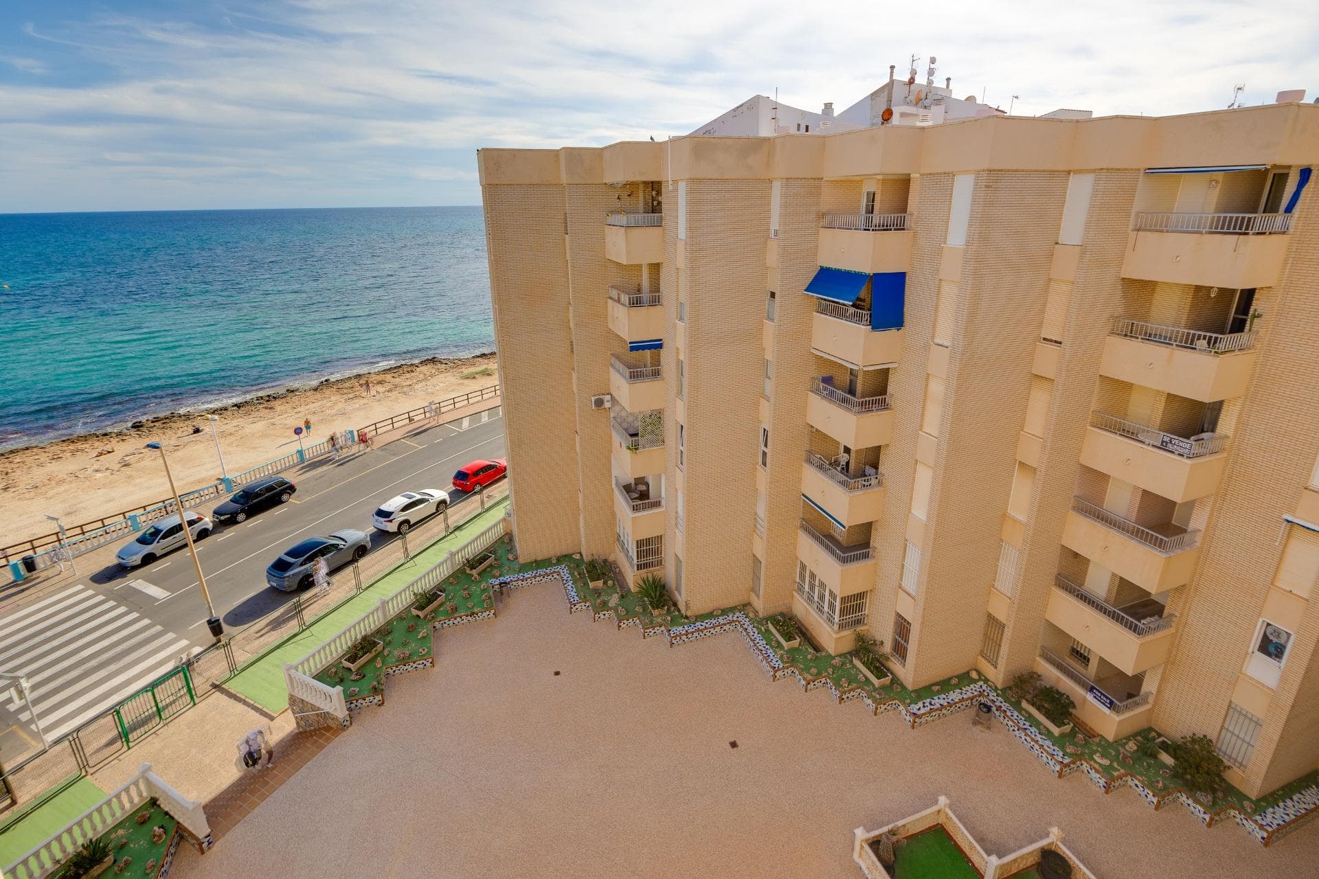 Front-line beach views & enhanced living space in the heart of Torrevieja Step into the exceptional — this stunning apartment offers direct, panoramic Sea views right from its Charming terrace, capturing the shimmering Mediterranean right at your doorstep. Having been thoughtfully transformed from a three-bedroom into a spacious two-bedroom layout, this residence now provides enhanced living comfort and elegance — delivering larger living and dining areas, generous bedrooms, and a refined flow throughout. Located in the vibrant Playa Los Locos, (The Crazy Beach being the literal translation) of Torrevieja, this home places you within an easy stroll of the golden sands, promenade cafés, restaurants and all the local amenities. You’ll enjoy waking up to the sea, lounging on the terrace as gentle waves roll past, and unwinding in a space that feels purposeful, bright and open. The bespoke conversion from three to two bedrooms was designed to elevate lifestyle: no more cramped guest rooms, but instead a layout where each space is meaningful. The master suite enjoys ample space, the second double bedroom remains very comfortable, ideal for family, guests or flexible use as a home office/gym. The open-plan living/dining area is now roomy enough for entertaining, daily living, and plenty of sea-view moments. Key features at a glance: •First-line location offering impressive uninterrupted views over the beach and coastline •Renovated to a high standard, repurposed from 3 bedrooms into a more luxurious 2-bedroom configuration •Charming terrace to savour the sea breeze and views — imagine morning coffee or evening wine with waves as your backdrop •Centrally positioned yet likely peaceful, giving you both the vibrancy of Torrevieja and the serenity of beachfront living •Ideal either as a dream main residence, holiday home or smart investment (combine appealing location with optimized layout) In short: this is a rare opportunity to secure a beachfront dwelling where the typical layout has been upgraded into something more elegant and spacious. If you’ve been searching for a property where views, quality and lifestyle combine, then this home delivers in spades.
