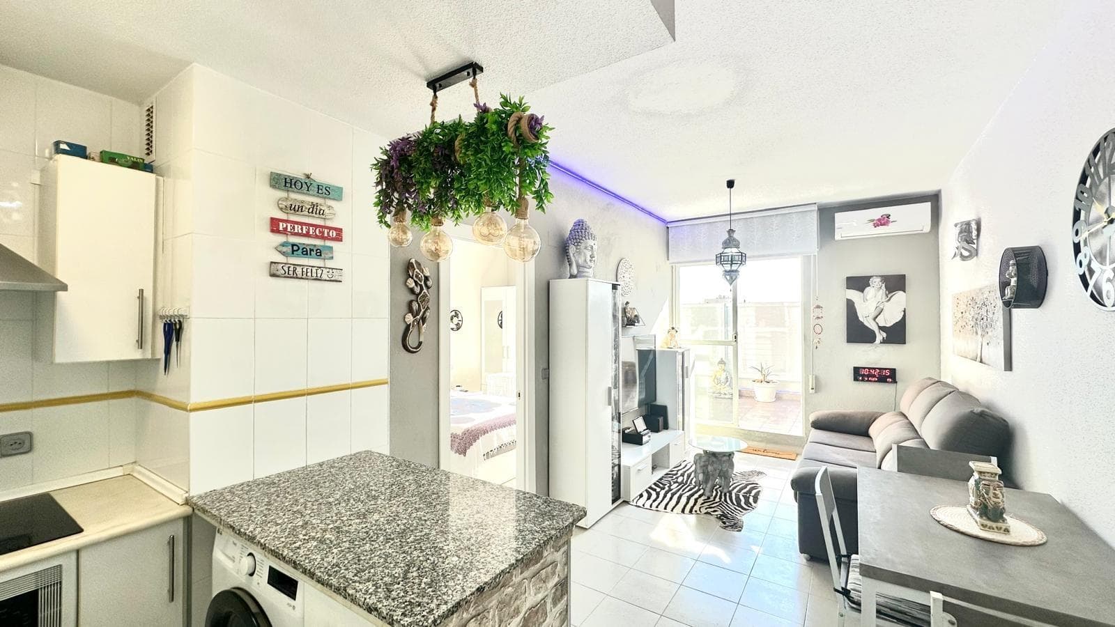 Renovated penthouse 800 meters from the beach in Torrevieja We present this magnificent penthouse located just 800 meters from the sea, an ideal location for those who want to live close to the beach and enjoy the Mediterranean just steps away, with the convenience of having all amenities at hand. The home has been completely renovated with a modern and contemporary design, making it ready to move into without the need for any improvements. It features a master bedroom with an en-suite bathroom, an intimate and comfortable space that guarantees privacy and comfort. The bathroom, also renovated, stands out for its quality finishes and contemporary style. The spacious and bright living-dining room blends seamlessly with the open-plan kitchen, creating an open, functional, and welcoming space that invites you to share time with family or friends. To ensure maximum comfort at any time of year, the property has air conditioning with a hot and cold pump that efficiently controls the entire home. One of the greatest attractions of this penthouse is its 18 m² east-facing terrace, which provides morning sun and plenty of light throughout the day. It's a perfect space for breakfast al fresco, relaxing in the sun, or enjoying get-togethers in a pleasant setting. This penthouse perfectly combines location, comfort, and design, making it an excellent opportunity for both a permanent residence and a second vacation home, or as an investment for holiday rentals.