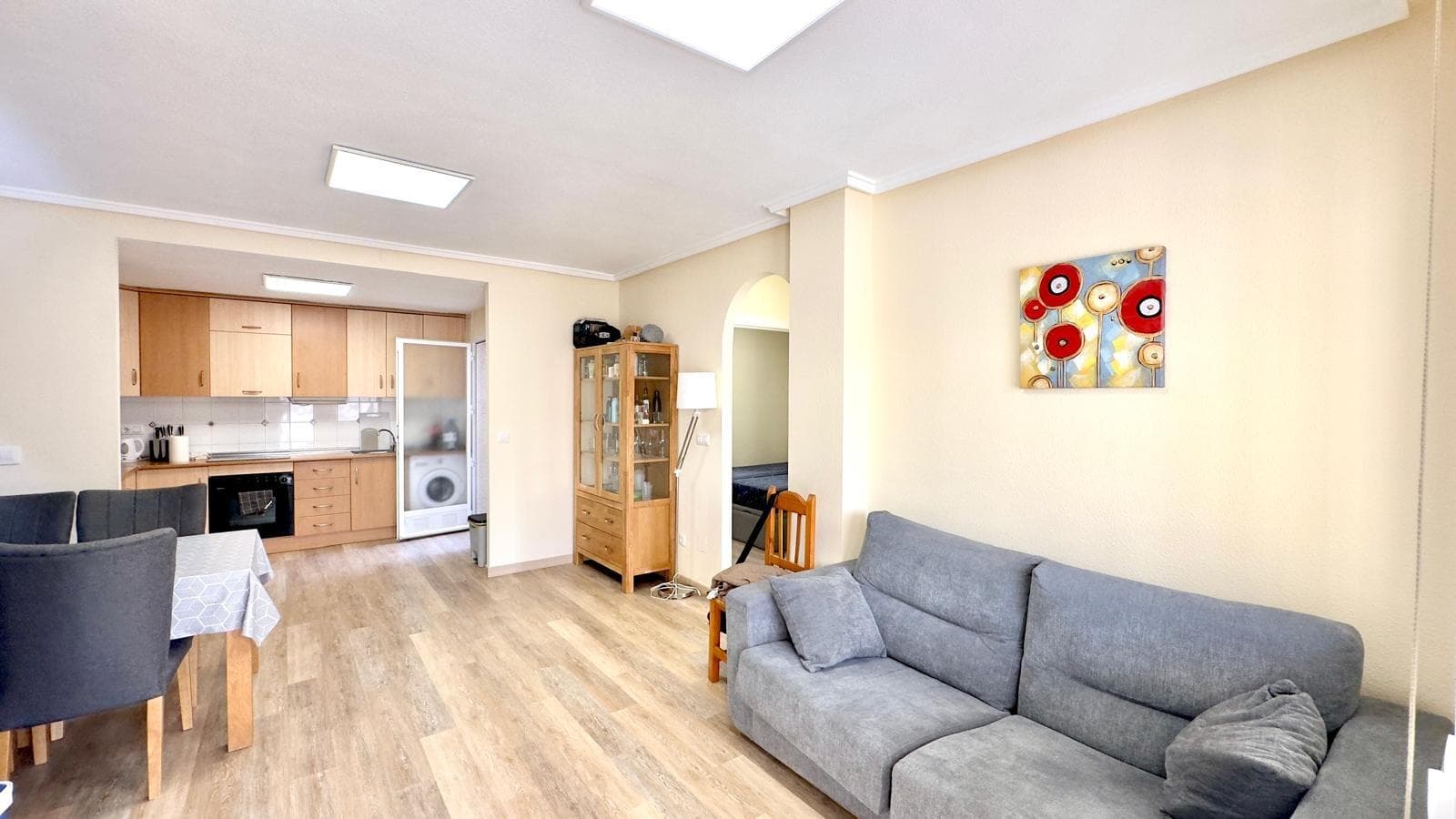 Bungalow in Torrevieja with communal pool, parking included, 2 bedrooms, 1 bathroom, separate kitchen, and patio. A home that embodies everything many people imagine when they dream of having their own corner of the Costa Blanca: sun, tranquility, a homey feel, and a perfect setting to enjoy both everyday life and holidays. Bungalow living: more than an apartment Living in a bungalow in Torrevieja is very different from living in a high-rise apartment. Here, life feels more grounded, more intimate, more like a quiet residential neighborhood where you know your neighbors and enjoy the outdoors almost as much as the indoors. Every time you enter, it doesn't feel like an "apartment building," but rather a cozy home within a gated community where the atmosphere is relaxed and family-friendly. The combination of comfortable living with a communal pool and common areas makes the whole place a little world of its own: a place you arrive at and need nothing more to feel like you can disconnect. Ideal for year-round living or as a second home for regular getaways to the beach and the pleasant climate of Torrevieja. A home that invites you to stay This bungalow conveys from the first moment the typical feeling of "a place you want to be." It's not just a place to stay for short periods, but a home to settle into, bring your belongings, your style, and your pace. The layout allows for comfortable living: a daytime area for spending time together, a nighttime area for truly resting, and outdoor spaces that expand how you use the house. The two bedrooms make it very versatile: perfect for a couple who want a master bedroom and another room for guests, an office, or a child's room; or for a small family looking for something practical and well-designed. The bathroom perfectly complements this type of home, making everyday life comfortable and hassle-free. Separate kitchen: the practical heart of the home The separate kitchen is one of the bungalow's greatest attractions. Having it separate from the living room allows you to cook without filling the entire house with smells and enjoy your own space for everyday life: preparing leisurely breakfasts, family meals, dinners with friends, or even organizing small special moments around the table. It's that kind of "traditional" kitchen, where you truly live: you talk, you cook, you plan the day, you get things ready for the pool or the beach. For those who value functionality and practicality, a well-designed, separate kitchen makes all the difference compared to other, more impersonal properties. The charm of the patio The patio is one of those spaces that ends up becoming the silent heart of the home. It's the place to have your first coffee of the morning in the fresh air, to enjoy lunches or dinners outdoors, where children can play safely, or where you can simply lie down and read for a while with the ambient sounds of the neighborhood in the background. It's also perfect for those with pets, plants, or who simply like having a small outdoor corner to decorate to their liking: lights, pots, a table, some chairs… With just a few touches, it transforms into a space with plenty of personality. In a city like Torrevieja, where the weather is good for much of the year, having a patio makes the bungalow a home that's enjoyed both indoors and out. Communal pool: summer all year round The communal pool is another major highlight. Having it just steps from home means that every sunny day can become a "mini vacation": go down for a swim, lie in the sun, let the children enjoy the water without having to drive or look for a spot on the beach. It's pure convenience. Furthermore, the pool serves as a natural meeting point for neighbors, creating a very pleasant social atmosphere.