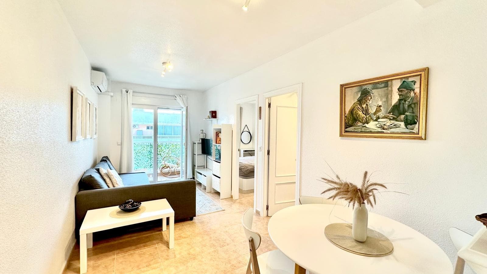 Penthouse apartment on Los Gases Street with 2 bedrooms and 1 bathroom, located in Torrevieja. This property offers all the charm of living on the top floor of a building, with that sense of privacy, light, and freedom that only the highest floors provide, in one of the most convenient and sought-after areas of the city. Living at the top in Torrevieja Living in a penthouse in Torrevieja is something special. It's not just about the height, but about how you experience daily life when you know you don't have neighbors above you, that the light enters differently, and that the sky seems closer. Los Gases Street is a well-known area of ​​the city, surrounded by amenities, well-connected, and with a vibrant atmosphere year-round, which makes this penthouse feel connected to the true pulse of Torrevieja. Every time you step outside, you'll find yourself immersed in the essence of a Mediterranean city that blends long-time residents with people from many countries who have chosen this place for its climate and quality of life. Living here means waking up knowing that in just a few minutes you can be enjoying a coffee on a nearby terrace, doing your shopping at a local supermarket, strolling along the seafront promenade, or taking care of any errands without having to travel far. At the same time, arriving home and going up to the penthouse feels like coming full circle: you leave the hustle and bustle below and, upon entering, you regain silence, privacy, and tranquility. It's a perfect balance between being in the heart of everything and, at the same time, having your own elevated refuge. A penthouse that feels like a sanctuary This penthouse isn't just another floor; it feels like a small world of its own at the top of the building. The moment you step inside, the feeling is different from that of a typical apartment: there's more sky, more light, a greater sense of being in a space that's somewhat removed from the noise of the rest of the building. The two bedrooms and the bathroom are integrated into a layout designed for comfortable living, with no wasted space, and a logic that simplifies daily life. The bedrooms make the apartment very versatile. This could be the perfect home for a couple who want a master bedroom and a second room for guests, an office, or a dressing room; also for a small family looking for a practical and well-located place from which to explore Torrevieja on foot. The second room offers that flexibility that is appreciated over time: today it can be an office, tomorrow a child's room, the day after that a creative space or extra storage area if needed. The bathroom easily meets daily needs, allowing for organized routines, chaotic mornings, and comfortable use whether you live alone or with others. Overall, the penthouse conveys the feeling of a functional home, designed to make the most of every square meter while also leaving room for everyone to adapt it to their own style. Light, sky, and a sense of spaciousness One of the great charms of a penthouse in a city like Torrevieja is the direct connection with light. The elevated position means that natural light takes center stage practically all day long. This luminosity transforms the feeling of the home: the spaces seem larger, the atmosphere is more cheerful, and the passage of time is noticeable in how the light moves through the rooms. The sensation of being closer to the sky is real. Looking out the windows and seeing rooftops, domes, facades, and, in some places, the clear horizon, creates a special connection with the surroundings. On clear days, which are most of them in Torrevieja, the sun shines brightly, warming the air in winter and bringing life to mornings in any season. On cloudy days, the penthouse maintains a soft light that invites contemplation, reading, and relaxation. This combination of light and height gives the home a very particular energy. It's easy to imagine peaceful Sundays spent indoors, barely leaving the house,