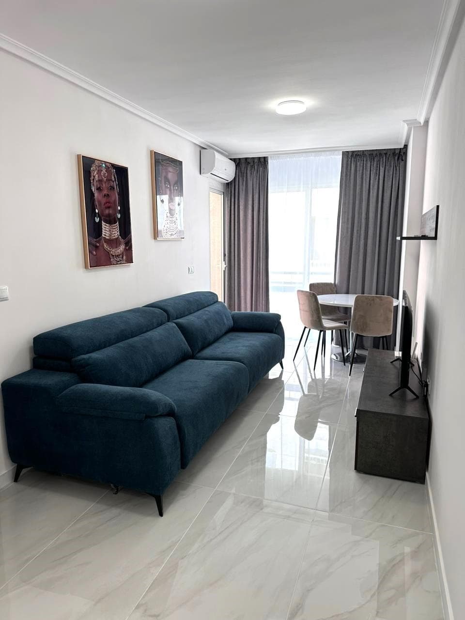 Charming 1 bedroom flat in Torrevieja. A true haven of style and comfort located on the first floor of a modern building with lift. With a surface area of 45 m², this flat has been totally refurbished with exquisite taste, combining contemporary lines, quality materials and careful attention to detail. From the first step, the flat transmits luminosity and warmth thanks to its south orientation and its completely exterior layout. Natural light bathes every corner of the space, enhancing the elegant flooring, modern furnishings and decorative details that make this home a welcoming and sophisticated place. The living-dining room connects seamlessly with a functional, open-plan kitchen, ideal for those who enjoy a practical lifestyle without compromising on design. The bedroom, spacious and serene, invites you to rest, and the bathroom, equally refurbished, offers a modern and relaxing ambience. As an added value, the property includes a convenient garage space, a privilege in the area that guarantees your peace of mind and daily comfort. Ideal for couples, professionals or as an investment, this flat has all the qualities to become a perfect home or a charming second residence. LOCATION: Torrevieja is in the province of Alicante (Costa Blanca). It is famous for its Mediterranean climate and its coast. We cannot forget its promenades where we can find some restaurants along the fine sandy beaches. It also has many excellent beaches such as Playa de los Náufragos, Playa de los Locos and Playa de la Mata. Therefore, it is considered a remarkable tourist town where the environment takes an important place as an important tourist attraction. In addition, we can find many shopping centres (Habaneras, La Zenia Boulevard), golf courses, sport centres, hospitals (such as Hospital Universitario de Torrevieja) and airports such as Alicante Airport (35 km away) and Region of Murcia International Airport (43 km away). DISTANCE TO THE SEA: 200m COMUNITY: 360 €. IBI: 210 €. Should you have any question do not hesitate to contact us!