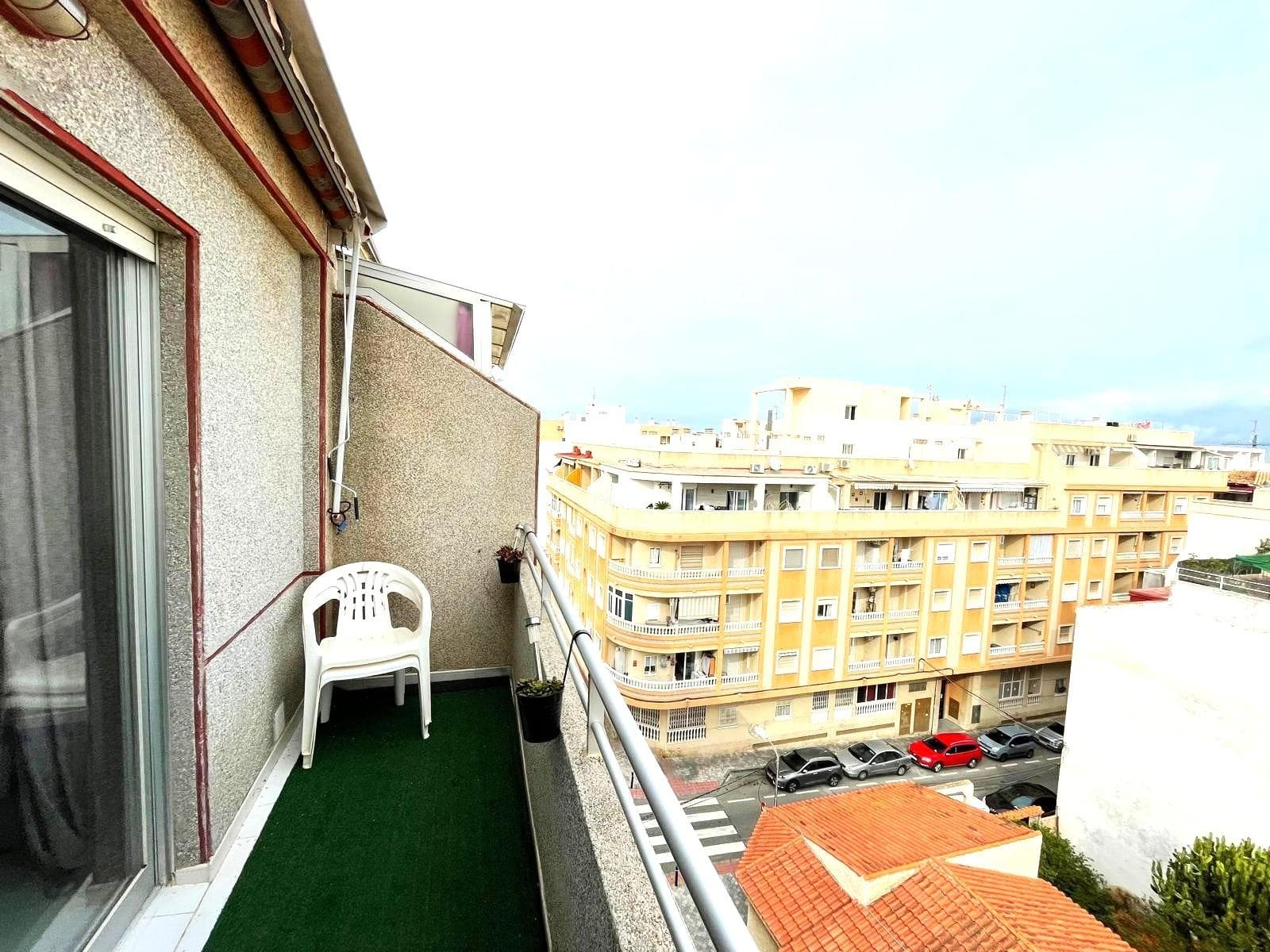 Penthouse unit featuring 2 bedrooms located in Torrevieja, just 300 meters from Playa del Cura beach. This lovely apartment is positioned on the 5th floor of a building equipped with an elevator. The property is in excellent condition and comes fully furnished. It consists of 2 bedrooms, 1 bathroom, and a living area that has an open-plan kitchen. The terrace boasts an area of 10m2. LOCATION: Torrevieja is in the province of Alicante (Costa Blanca). It is famous for its Mediterranean climate and its coast. We cannot forget its promenades where we can find some restaurants along the fine sandy beaches. It also has many excellent beaches such as Playa de los Náufragos, Playa de los Locos and Playa de la Mata. Therefore, it is considered a remarkable tourist town where the environment takes an important place as an important tourist attraction. In addition, we can find many shopping centres (Habaneras, La Zenia Boulevard), golf courses, sport centres, hospitals (such as Hospital Universitario de Torrevieja) and airports such as Alicante Airport (35 km away) and Region of Murcia International Airport (43 km away).  DISTANCE TO THE BEACH:300m IBI costs:218 euros per year COMMUNITY costs:345 euros per year