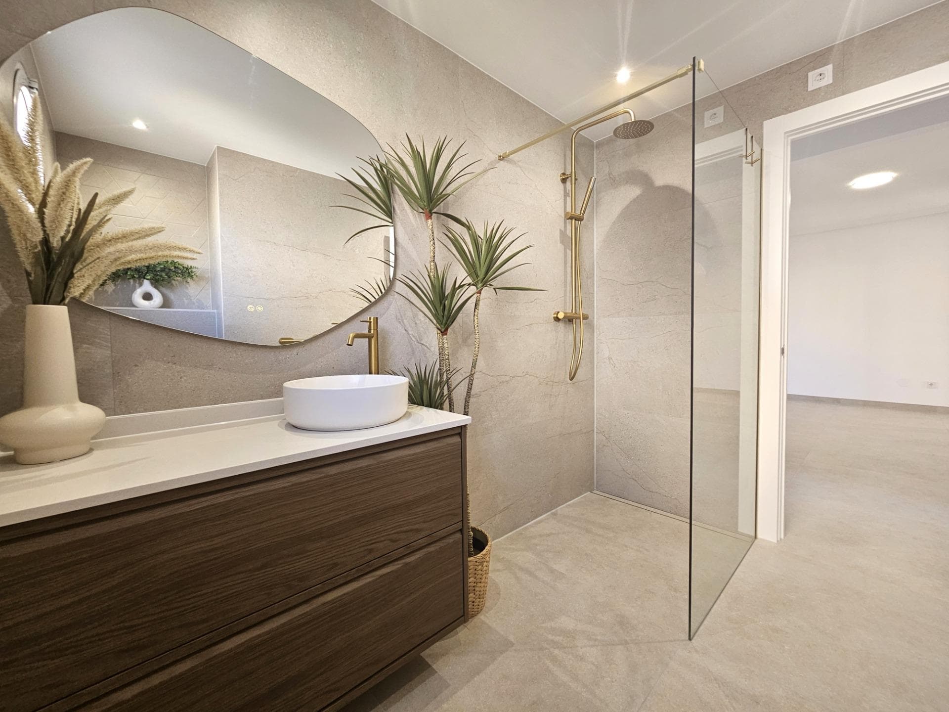 Discover a remarkable opportunity to own a beautifully renovated apartment that combines modern living in a traditional setting. This stunning first-floor apartment showcases the perfect blend of style and functionality. The living space is bathed in natural light and flows perfectly into the brand new kitchen with breakfast bar waiting to prepare delicious meals. The property comprises of 2 bedrooms, each including fitted wardrobes and 1 fully renovated bathroom with walk-in shower. The cabinet includes draws and a mirror with LED backlight and anti-condensation function. The golden finishes make this stunning bathroom really stand out. The kitchen comes with new white goods and a new electric waterheater.  The East facing balcony offers views of the surrounding areas and gives the opportunity for al-fresco dining and your morning coffee, making sure you enjoy the mediteranean climate tot he maximum. Conveniently located just 2.8 kilometers from stunning blue flag beaches, you'll have quick access to sun-soaked shores and refreshing sea breezes. The area is also just a short stroll away from supermarkets and essential amenities, ensuring that everything you need is within easy reach. Alicante airport is only 50 minutes away by car. The property will be sold unfurnished giving the new owners the opportunity to put their own stampo on it and make it a real home. Features: •Hot/cold aircon in living room and master bedroom •Brand new appliances •New kitchen •New bathrooms •New floor •New doors and frames •New sockets and plugs •Open distribution •LED spotlights •Freshly painted •New mechanism in shutters •New waterheater Dont miss this unique opportunity. Schedule a viewing today and step into your new dream apartment. In the last meeting of the community of owners they aproved the possibility to apply for a tourist licence of each property making this a great investment opportunity.