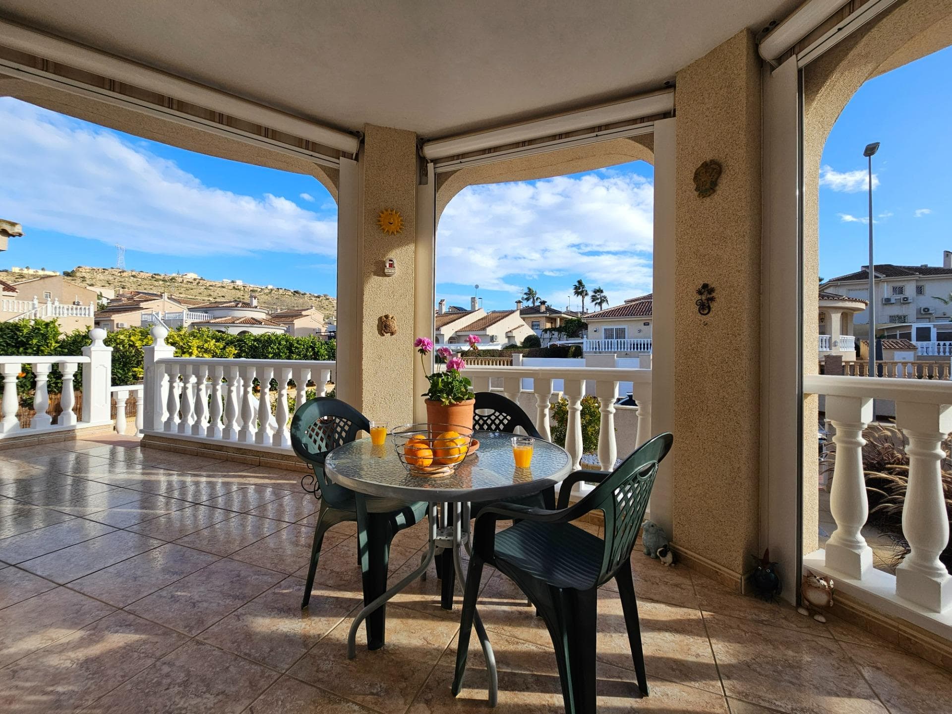 We are proud to present to you a 3 bed 2,5 bath detached villa with separated underbuild in absolutely stunning condition, located in the sought after urbanisation Benimar III, conjunto Maite VII. Sitting on a plot of 228M² offering off road parking, low maintainance garden with automatic irregation system, lovely fruit plants, and a covered terrace to enjoy your morning coffee and a-fresco dining. Stained glass next to the entrance gives you a colorful welcome into the home which consist on the ground floor of a ample lounge/living room, a fully equipped open plan kitchen, a dining area, a double bedroom, a showerrroom and a guest toillet. From the living room there is direct access trough French doors to the sunny terrace, overlooking the beautiful garden and the surrounding areas. The underbuild can be accessed through a separated entrance which comprises of 2 double bedrooms, a showerroom, laundryroom and a large livingroom, including a kitchen, perfect to organise family gatherings. The property has been upgraded during the years and has been very well looked after. The community pool can be found just around the corner, same as the natural park Cañada Marsá, ideal for romantic strolls and enjoy the local wildlife. EXTRAS: airconditioning, ceiling fans, double glazed windows, underfloor heating on ground floor, renovated bathrooms, water softener, partially furnished, sky tv, marble kitchen worktop, towelrack, drinkwaterfilter, appliances. Benimar is a popular urbanisation with a nice expat community comprising of low buildings and wide streets, and full of amenities. The proximity to larger towns of Benijófar, Rojales en Ciudad Quesada make this an outstanding option for both residential living or as a second home. The beaches of Guardamar are only a short drive away and the airport of Alicante can be reached in less then 40 minutes.