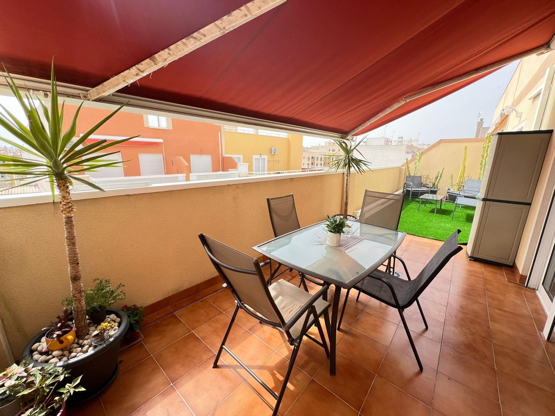 *Luxury Penthouse in the Heart of the City with High Profitability and Panoramic Views* This spectacular 75 m² penthouse, located just 400 meters from the beach in Torrevieja, stands out for its modern and elegant design, featuring an *impressive 30 m² private terrace* with panoramic city views. The property is nearly new, boasting high-quality finishes including porcelain floors and aluminum/climalit exterior carpentry, ensuring a solid construction and a contemporary aesthetic. The interior is bright and open, with large windows allowing plenty of natural light. The open-concept kitchen is equipped with state-of-the-art appliances, seamlessly connecting with the living room, which opens onto the terrace—ideal for outdoor enjoyment. *Key Features:* - 2 spacious double bedrooms and a functional bathroom with modern finishes. - Centrally located in Torrevieja, surrounded by essential services: supermarkets, pharmacies, shops, and public transport. - Direct access to the AP7 Mediterranean Motorway and only 40 minutes from Alicante International Airport. - *Extras*: elevator, heating, exceptional natural light, and high-speed internet. *Investment Advantages:* - *Tourist License* offering *high annual profitability*, perfect for investors or as a primary residence. - *Low community fees*: 35 euros per month. This penthouse not only offers a luxurious living space but also represents an excellent investment opportunity in one of Torrevieja's most sought-after areas. Contact us for more details or to schedule a visit!