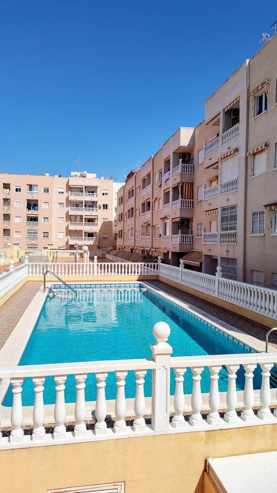 We present this central apartment located in the city of Torrevieja, in an urban area close to shops, restaurants, pharmacies, supermarkets, schools.. It is just a 15-minute walk from the natural pools and the promenade. This property has: - Two bedrooms. -A bathroom. -Living-dining room - Equipped kitchen. -Balcony. -Patio. It also has a communal swimming pool. Sold unfurnished. Do not miss this opportunity and contact us to give you more information about this property.