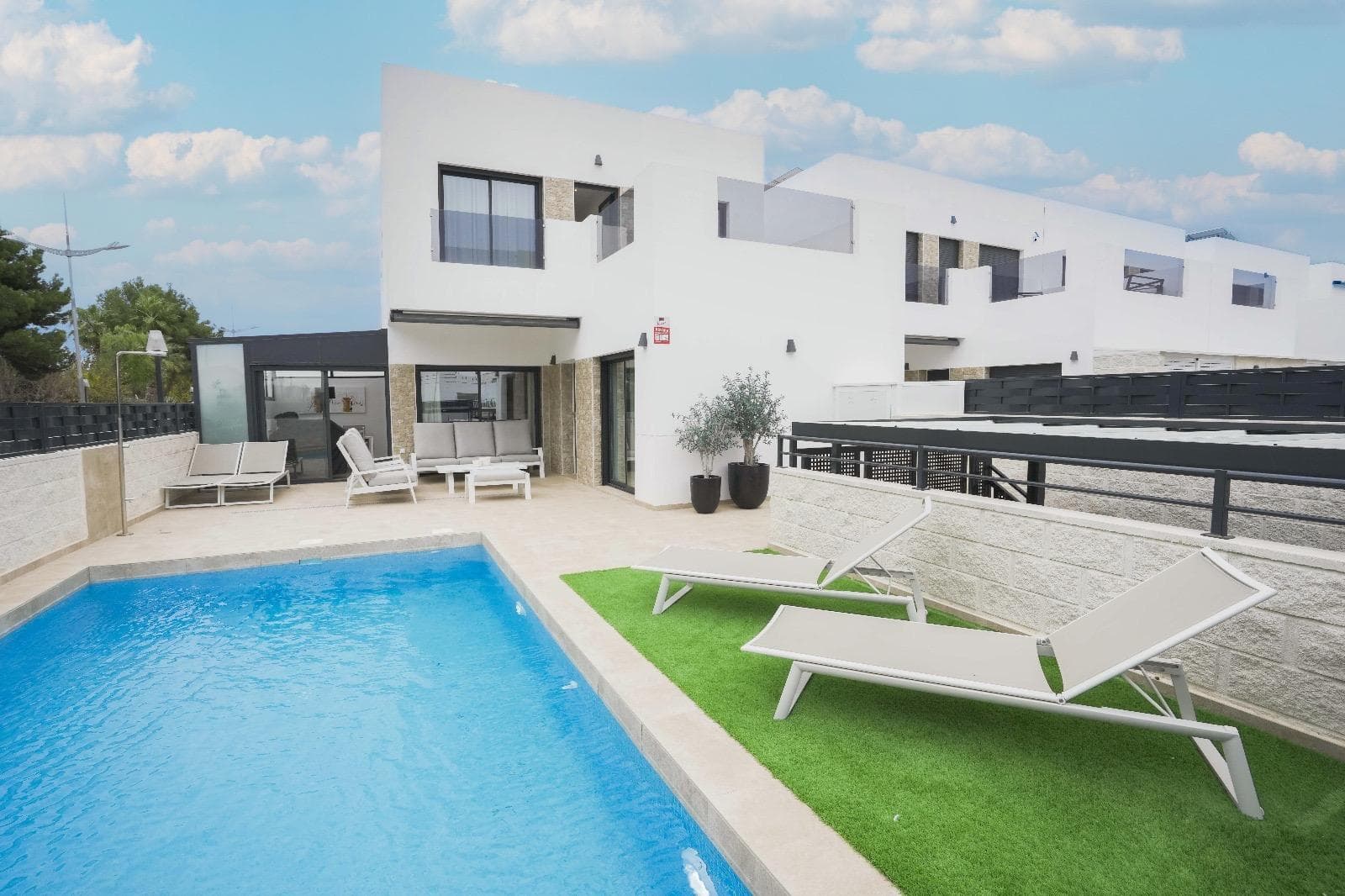 This stunning villa, built in 2023, offers modern living in the peaceful area of ​​Dolores, Alicante. Dolores is a charming town located in the province of Alicante, offering a relaxed, rural atmosphere while being close to the Mediterranean coast. The town has all essential services, including supermarkets, shops, medical centers, schools, and restaurants. Its location provides easy access to larger cities such as Torrevieja and Orihuela, as well as beautiful beaches just a few minutes' drive away. Dolores is perfect for those seeking a peaceful and authentic lifestyle in Spain, with all the comforts of modern life. With 3 spacious bedrooms and 2 bathrooms, the villa is designed for comfort and convenience. The open-plan living area is bright and spacious, seamlessly connecting with the fully equipped kitchen. Step outside to enjoy the covered dining area, ideal for al fresco dining and entertaining guests. The private pool offers a relaxing space to unwind, while the on-site parking area provides secure parking. This villa combines contemporary style with practical living, making it an ideal choice for those seeking a modern and tranquil lifestyle in Alicante.
