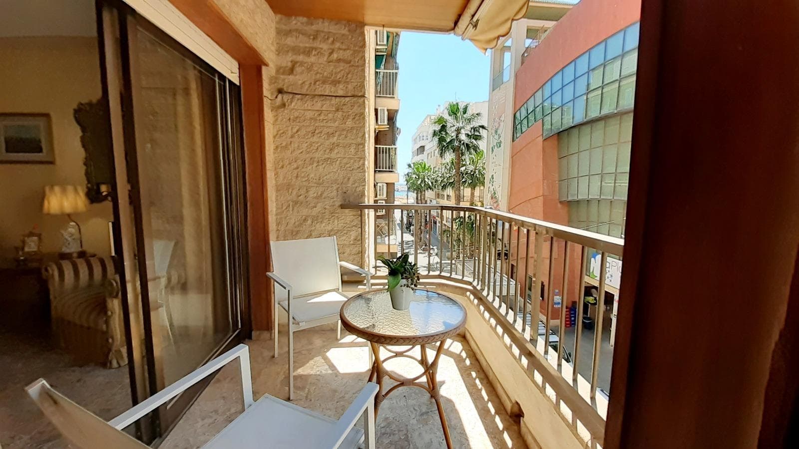 We present to you this spacious property in the heart of Torrevieja, just a 10-minute walk from the fishing port and the Juan Aparicio promenade, where you can enjoy the Mediterranean sun in the beautiful natural pools. Without a doubt, this property has an excellent location, with all services at your fingertips such as the market, restaurants, pharmacies, shops... The home is distributed as follows: -4 Bedrooms. -2 Bathrooms. -Spacious living-dining room with access to balcony. -Independent equipped kitchen. -Patio. It is sold fully furnished and equipped. Shall we schedule a visit? Contact us, we will be happy to assist you.