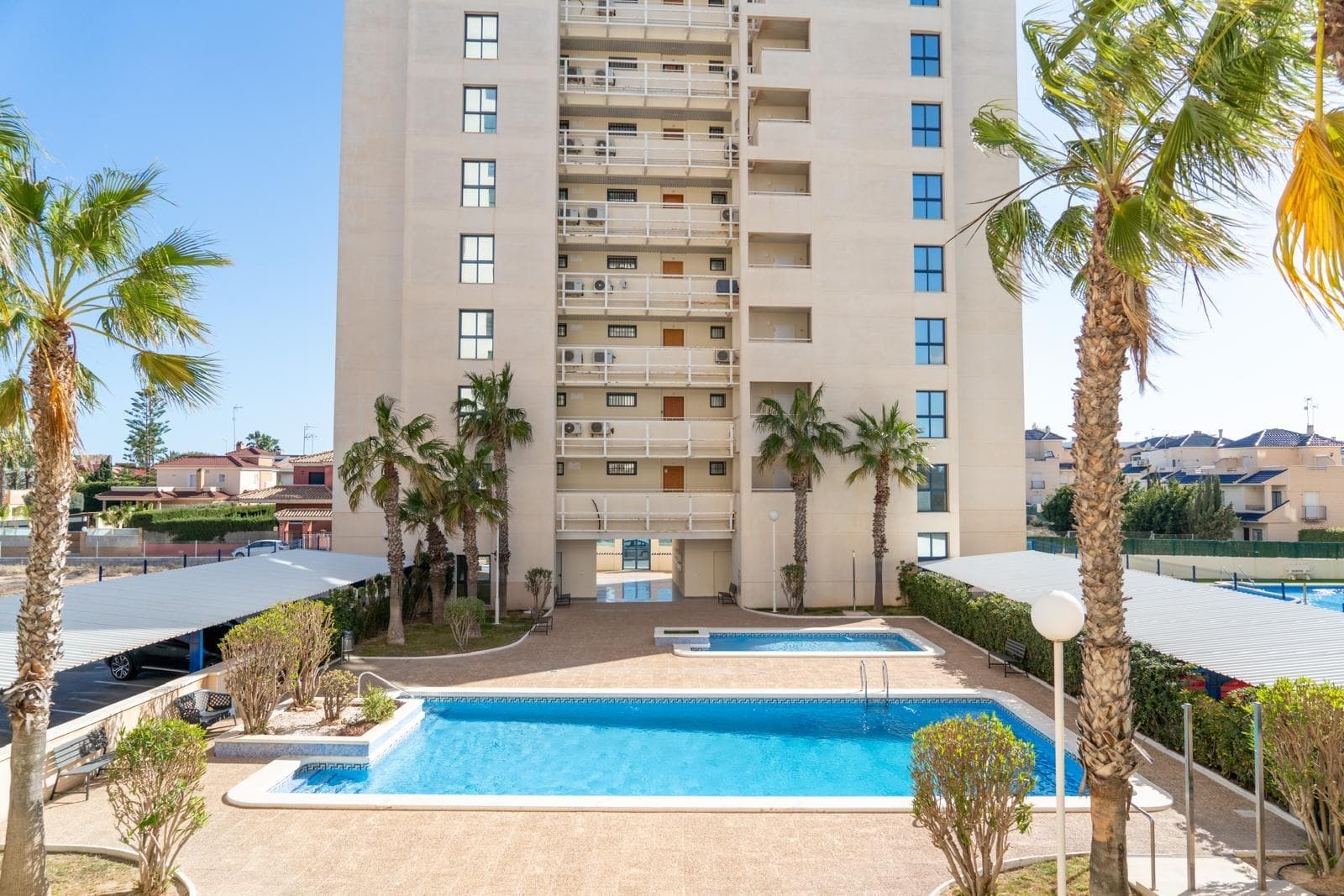 Discover this spectacular, completely renovated two-bedroom apartment in the coveted area of ​​La Veleta, Torrevieja. With a constructed area of ​​almost 95 m² and located just 120 meters from the sea, this property is ideal for those looking to enjoy a coastal lifestyle without sacrificing modern comforts. The property features two spacious double bedrooms and two full bathrooms, perfect for families or guests. Its notable features include side sea views from its private terrace and access to a refreshing communal pool surrounded by beautiful green spaces within the gated community where the apartment is located. In addition, it enjoys enhanced security with a security door and is strategically located close to public transportation as well as local shopping centers and schools, providing additional convenience to your daily life. Contact us for more information.
