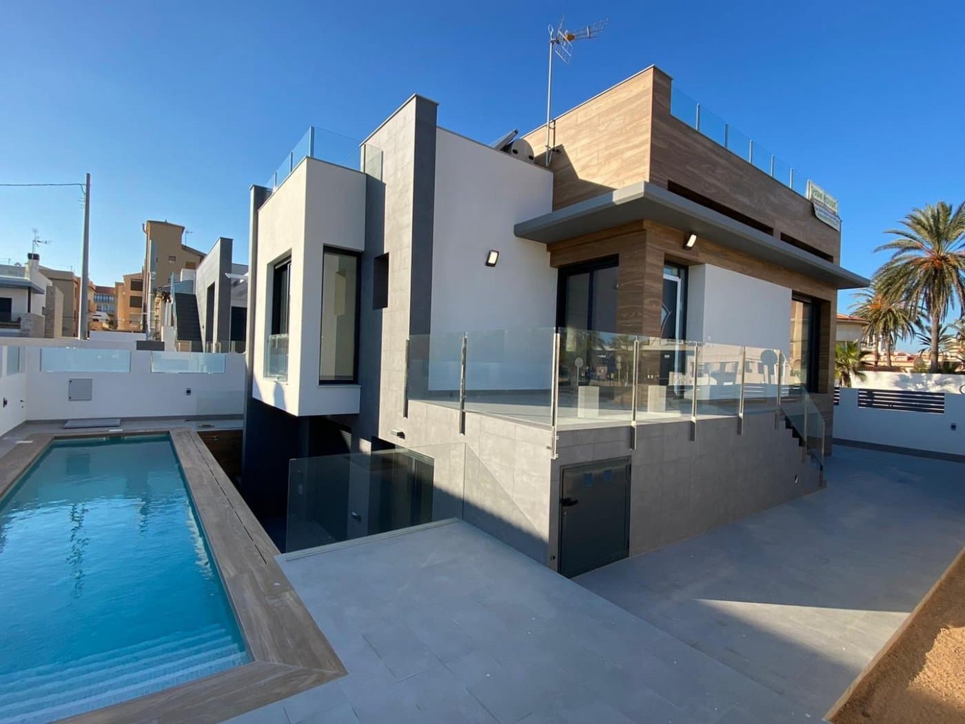 &#13; FANTASTIC MEDITERRANEAN VILLA 60 m TO THE BEACH AND WITH SEA VIEWS!!!!&#13;&#13; A unique opportunity - to buy a modern house 1 minute from the beach with direct sea views, in the best part of the town of Torrevieja - La Mata, area with very well developed infrastructure. It is a small fishing village with all the necessary services for day to day life, with 9 km of fine sandy beaches and with a climate that offers you 300 days of sunshine a year with an average temperature of 20ºC.&#13;&#13; Detached villa in an area of wide avenues and unbeatable location, with a plot of 320 m² and private swimming pool.&#13;&#13; Total constructed area of 310 m². Consists of 4 double bedrooms (2 en suite), 4 bathrooms, 2 living rooms and kitchen, plus private parking, terraces and solarium with sea views.&#13;&#13; La Mata is connected by bus with Torrevieja and Alicante. There are 2 hospitals nearby. Golf courses 6 km. Alicante airport 42 km.&#13;