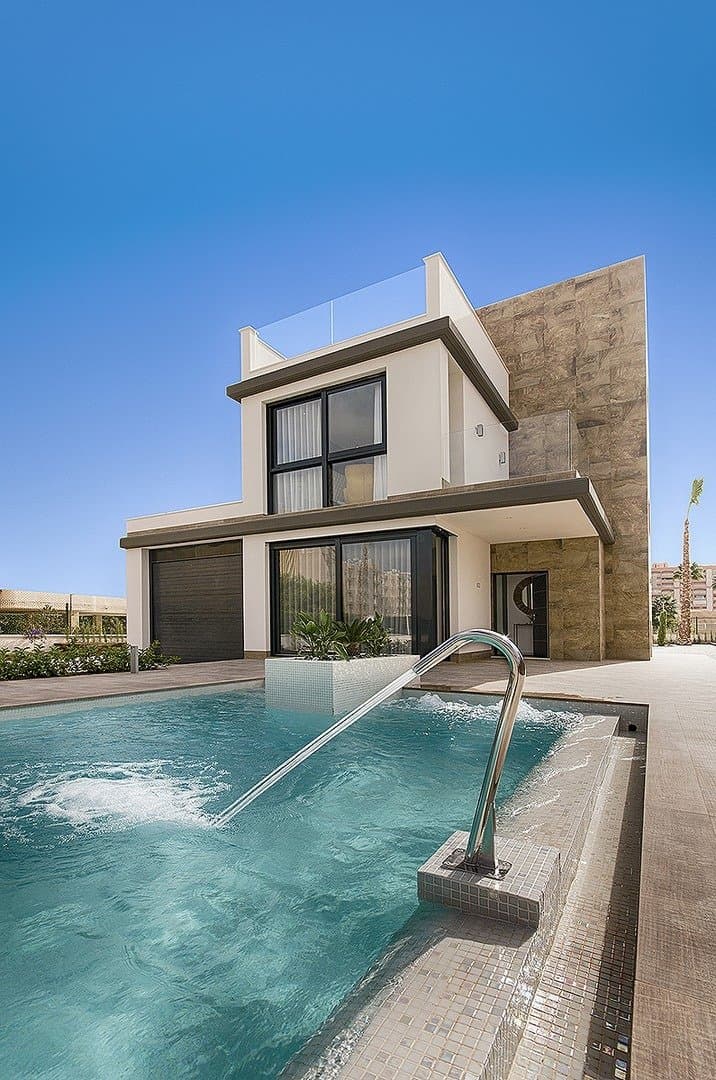 NEW BUILD VILLA IN ORIHUELA COSTA (CAMPOAMOR)&#13;&#13; Do you want to enjoy an exclusive vacation near the sea? Impossible not to fall for this ultra-modern villa in Orihuela Costa with 4 bedrooms, 2 bathrooms, private pool, garden and luxury extras, according to personal preferences. Its delicate infrastructure integrates with nature providing a quiet and isolated environment.&#13;&#13; Built with the highest quality materials, this elegant property is surrounded by abundant vegetation and a few meters from the cleanest beaches in Campoamor: Playa de la Glea, Aguamarina and Cabo Roig. It is a pleasure to have these three beautiful beaches that have been awarded with the Blue Flag within reach. Whenever you need a moment of reflection, you can go down to touch its crystal clear waters or lie down on its soft sand to read a book while listening to the placid sound of the sea.&#13;&#13; In the surroundings you will find all the essential services to live all year round: supermarkets, pharmacies, cafes, restaurants, shopping centers ... And if you are also enthusiastic about golf, less than 10 minutes away you can choose between three privileged golf courses of international recognition where put your aim to the test: Las Colinas Golf, Villamartín or Las Ramblas.&#13;&#13; The promotion includes several models of homes with 2,3,4 and up to 5 bedrooms. This particular villa consists of 4 double bedrooms, 2 bathrooms, a fully equipped American kitchen, an open living-dining room with great lighting, access to the garden and the beautiful pool.&#13;&#13; In addition, the price includes:&#13; Underfloor heating and mirror in bathrooms&#13; Indoor and outdoor lights&#13; Built-in wardrobes&#13; Security door&#13; Pre-installation of air conditioning&#13; Top brand appliances&#13;&#13; The house follows the trend of open concept design, enhancing spacious spaces and offering a greater sense of comfort and well-being in its interiors.&#13;