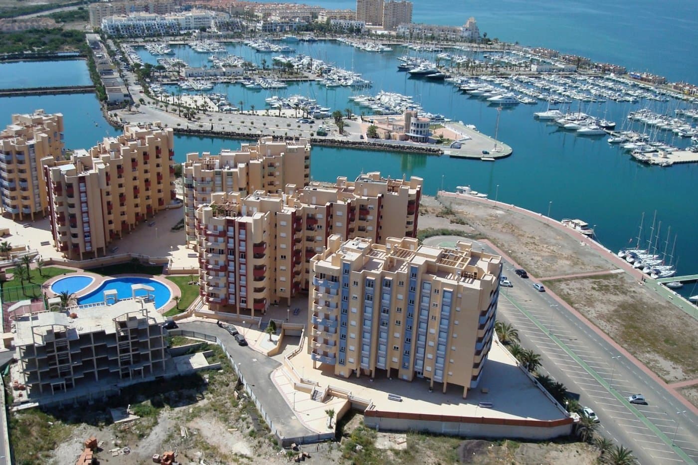 BEAUTIFUL SEA VIEW APARTMENTS IN LA MANGA&#13;&#13; This urbanization is located in the largest expansion area of ​​La Manga.&#13; In this new urbanization the homes have been designed to take advantage of every corner of the house, as well as the care in choosing the materials and their design.&#13; Apartments with armored entrance door and doors lacquered in white with stainless steel fittings.&#13; White, monobloc blinds and double glazing with air chamber.&#13; In the master bedroom built-in wardrobe with sliding doors, with a separating shelf in the mezzanine, a bar and a chest of three drawers.&#13; Kitchen with high and low furniture, in white, gola-type handle, single sink with drainer, ceramic hob, electric oven and extractor hood.&#13; Pre-installation of air conditioning (cold and heat) through conduits with provision of zoning of rooms.&#13;&#13; La Manga del Mar Menor is a natural strip of land surrounded by two seas, the Mar Menor and the Mediterranean Sea. To this rarity you can add the multiple leisure and free time options, restaurants, supermarkets, medical centers, pharmacies, nautical sports centers, golf courses.&#13; La Manga is located on the north coast of the Costa Calida and is a popular holiday destination for tourists. The narrow land strip separating the warm lagoon and the colder sea has a unique microclimate. It’s one of the most exotic areas in Spain.&#13; Corvera airport is about 1 hour drive away and Alicante airport about 2 hours away.&#13;