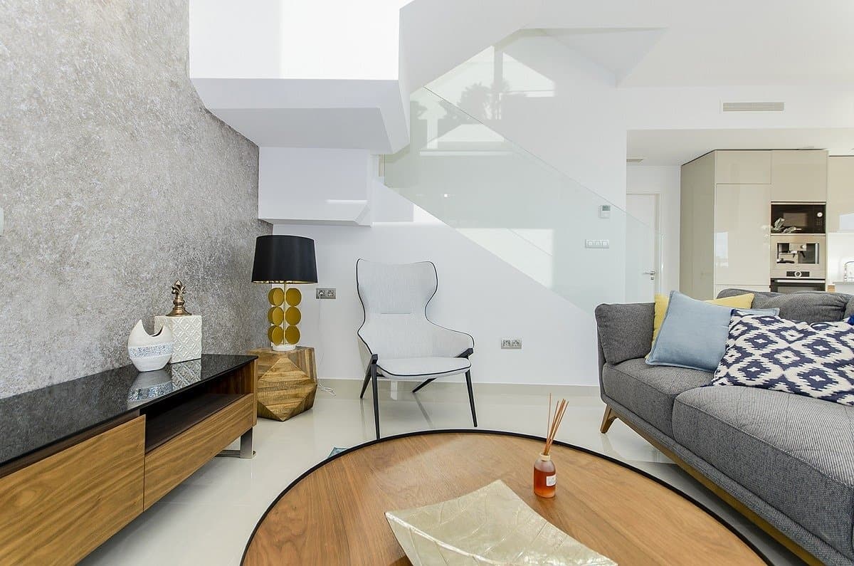 NEW BUILD RESIDENTIAL OF VILLAS IN LOS MONTESINOS New Build villas with 3 bedrooms and 3 bathrooms, open plan kitchen with living room-dining room. All villas have a terrace, a private swimming pool, a private garden, and a driveway.  Basements are also available at an extra cost. They are all built with high-quality materials using advanced technology for our clients’ comfort and convenience. The typical town of Los Montesinos is strategically located 10 minutes by car from the beaches and leisure of Torrevieja (with all the services of a big city: theatre, 2 hospitals, international schools, etc.), from several golf courses and with easy access to the A7 motorway to reach Alicante airport in 20 min. In the urbanization there are supermarkets and bars for day-to-day service, being a rural and quiet environment.  The climate in this area guarantees 300 days of sunshine a year with an average temperature of 20ºC, which, together with the rich gastronomy and cultural and sports activities available in its surroundings, makes this area an ideal place to establish a second residence for vacation or a quiet place to live permanently.