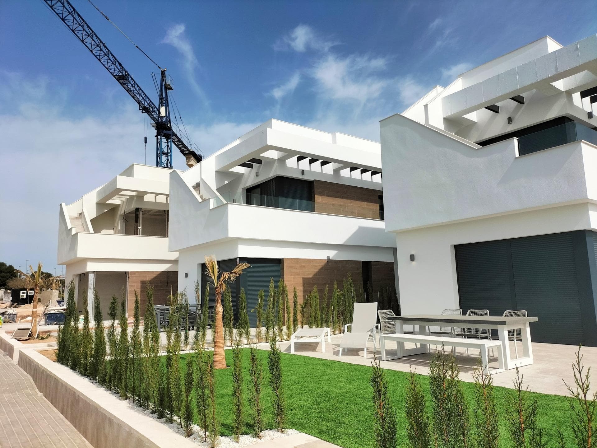 NEW BUILD VILLAS IN PILAR DE LA HORADADA ON THE GOLF COURSE&#13;&#13; New Build an exclusive and luxurious project of villas at Lo Romero golf, Pilar de la Horadada.&#13;&#13; New Build community villas will be the excellent homes for you and your family. With a layout of three bedrooms and three bathrooms, apart from its 45 m2 of terrace, the house will have all kinds of commodities to make your stay a wonderful one.&#13;&#13; It is only 100 m from the golf course and 5 min from the entertainment venues, including the beach, just 6 km away.&#13;&#13; It has southeast orientation. &#13;&#13; In addition, it has private parking space and fitted closets. And not only that, these villas have at your disposal a communal pool, an ideal area for barbecues and an outdoor lounge area to relax.&#13;&#13; &#13; Pilar de la Horadada is a typical Spanish village in the most southern part of the Costa Blanca.&#13;&#13; The large main street has supermarkets, lots of shops, restaurants and bars and some lovely squares. &#13;&#13; The beautiful beaches of Torre de la Horadada and Mil Palmeras with fine sand promenade is just 5 minutes away. &#13;&#13; Lo Romero Golf is the perfect course for golfers who are passionate about golf and the Island of Golf is an ideal course for golfers for all levels of ability.&#13;&#13; The airports of Corvera (Murcia) and Alicante are respectively 40 and 55 minutes away.&#13;