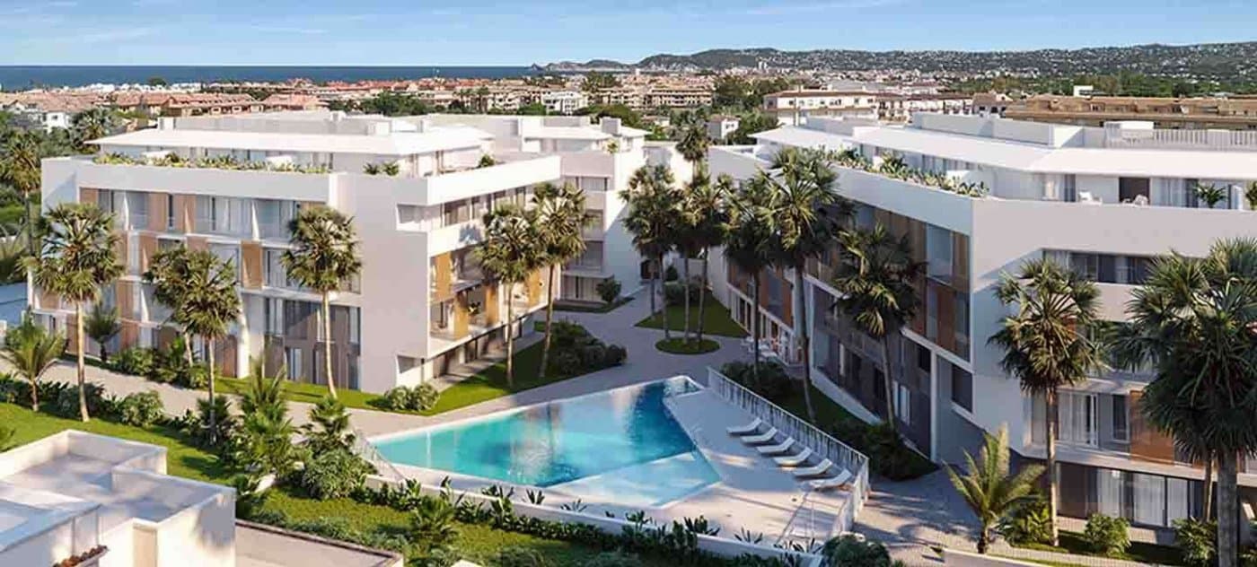 NEW RESIDENTIAL IN JAVEA 5 MINUTES FROM THE BEACH, THE PORT AND THE CENTER !!!

 New residential a few minutes from the beach that consists of 58 homes with 2, 3 and 4 bedrooms distributed on the ground floor with a garden, apartments with terraces on intermediate floors, penthouses and duplexes with large terraces. In addition, all homes will have a garage and storage room. The residential complex will have a swimming pool and a social club.

 You can configure different aspects in the distribution, finishes and extra options of your home. Adapt your new home to your tastes and preferences and create the environment you have always wanted.

 With interiors cared for in detail, the exterior of the house could not be less. Perfectly combining avant-garde trends and the timeless elegance of the most classic constructions, the beautiful aesthetic of the building lies in its façade through textures and colors integrated into its surroundings.

 Enjoying your new home in a magnificent location, with everything you need at your fingertips: restaurants, pharmacies, supermarkets, health centers, and the Molins De La Plana, a green lung in Jávea. In addition, in the vicinity of your new construction home you will find the Jávea bus station and the CV-734 road for easy access.