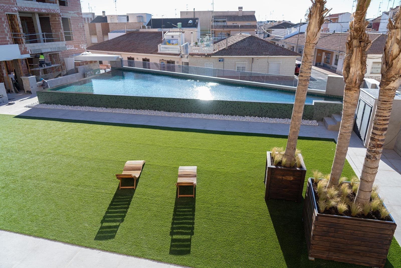 NEW BUILD RESIDENTIAL IN SAN PEDRO DEL PINATAR&#13;&#13;New Build residential complex of modern apartments and penthouses in San Pedro Del Pinatar .&#13;&#13;Apartments and penthouses with 2 and 3 bedrooms, 2 bathrooms, with open plan fully equipped kitchen with white goods - Bosch or Siemens, living area, large terraces, fitted wardrobes, fully equipped bathrooms with underfloor heating, aircon, electric shutters, closed storage, parking space with socket 16 Amp for electric cars.&#13;&#13;Beautiful communal garden area whit artificial grass and Infinity pool with heat pump.&#13;&#13;San Pedro del Pinatar's privileged location on the Mar Menor and Mediterranean coastline it attracts those with an interest in sailing and watersports, providing marina mooring and sailing clubs, while the beaches and natural mud baths attract those seeking safe sun, sea and sand.&#13;&#13;San Pedro del Pinatar has an established community and offers an excellent range of activities, including covered swimming pool and sports facilities, as well as a year round programme of social activities by the pleasant winter weather. The benefits of the mud baths, typical of the region, or the calm waters of the Mar Menor, have favoured the growth of Lo Pagán, which currently has all kind of amenities. In addition, it has an excellent location, just 5 minutes from the Commercial Centre Dos Mares.&#13;&#13;Murcia/Corvera airport is 30 minutes away and Alicante airport is an hour drive away.&#13;