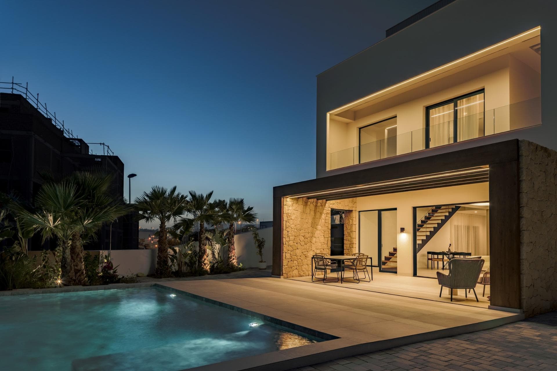 NEW BUILD VILLAS IN FINESTRAT&#13;&#13;New Build Modern villas in Finestrat.&#13;&#13;Villas with 4 bedrooms and 4 bathrooms, open plan kitchen with lounge area, terrace with magnificent views over Benidorm, private garden with swimming pool and parking space.&#13;&#13;The lateral garden, adorned with cacti and white gravel, connects the Access Level 1 with the main floor (Level O).&#13;&#13;The use of natural grass in the rest of the terrain is presented as an additional feature through a meticulously designed landscaping project.&#13;&#13;Each level is accentuated with a material that enhances its essence. Level O is clad in natural limestone, providing support to the entire structure. &#13;Level 1, with its monolayer finish and wooden shutters, safeguards the most intimate part of the residence. &#13;Finally, Level 2, where the master bedroom is located, opens up to a spacious terrace and is finished with textured monolayer in a warm tone.&#13;&#13;The Mediterranean aesthetic is achieved through a perfect fusion of tradition, modern architecture, and nature.&#13;&#13;Finestrat located in the Marina Baixa region of the Costa Blanca, close to neighbouring Benidorm and about 40 kilometres from the city of Alicante and the international airport.&#13;&#13;The village is situated on the mountainside of Puig Campana and offers beautiful views of the mountains, the coast and the Mediterranean Sea.&#13;&#13;Benidorm is just a five-minute drive from the properties and offers all the services you would need including shops, bars, restaurants, supermarkets, banks, pharmacies and several private international schools.&#13;