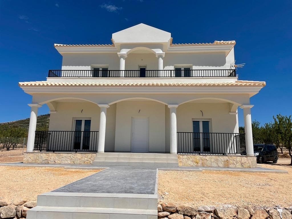 NEW BUILD VILLAS IN PINOSO&#13;&#13;You can choose Villas with traditional Spanish touches or super modern finishing, bright and clean. &#13;Different legal building plots available (rustic with minimum 10.000 m2), some walking distance to town, some totally private and our most popular ones are within 5-10 mins drive to a town. &#13;We have a plot for every taste, all with amazing views and all have mains water + electric included in the price and high speed internet available. &#13;From the biggest and best builder in the area and use top quality materials for a perfect finish. &#13;All houses include 2m stamped concrete terrace around the pool (colour and pattern to choose), 1m around the house, gated entrance, 3.000 m2 fencing, pre-installed ducted aircon, standard kitchen, security door, german tilt and turn windows (or sliding if prefered), built-in fireplace and chimney, pre-installation for tv and internet, gravel driveway plus a few meters around the house, septic tank. &#13;Bathrooms include a shower column, shower tray or bath, sink units (various colours to choose from) with sinks, taps and mirrors, plus a big selection of wall tiles. &#13;Wide selection of ceramic floor tiles, different colours, wood effect, etc. &#13;Kitchens include cabinets with standard doors and handles, as per plans provided, stainless steel sink and tap, pre-installation for oven, dishwasher, extractor. Various granite worktops to choose from included in the budget, other stone worktops available as extras. White goods not included. &#13;Marble staircase (cream, white, or grey) and railings included, plus railings for the front porch. &#13;Big fixed glass window on the staircase for extra light. &#13;Choice of tiles and steps design for swimming pool. Choice of the granite for the houses' exterior steps and window sils. &#13;You can customise the house to suit, most internal changes are free of charge, the houses can be extended and we can even build your own design. &#13;Upgrade to bigger pool, single or double garage, guest house, etc. at an extra cost.&#13;&#13;The beautiful and thriving town of Pinoso is approximately 45 minutes inland from Alicante and the white beaches of Costa Blanca and close to the Murcia, Alicante border&#13;&#13;It has a population of just under 8,000. Pinoso, also known as El Pinos is named after the pine trees that cover the areas mountain ranges. Pinoso provides a Spanish rural lifestyle, no traffic lights, hardly any traffic, practically the only jams are caused by the tractors taking the grapes to the Bodega. The fields are planted with vines, almonds and olives. In February the fields are filled with pink almond blossom.&#13;&#13;Pinoso has many bars, restaurants and shops, a new 24 hour medical centre, dentists, two primary schools and 1 secondary school, a theatre. There's an excellent Sports Centre with outdoor swimming pools, tennis courts, football pitches and gymnasium, library and many other facilities including a beautiful picnic area among the pines, complete with barbecues, seating areas and running water.&#13;