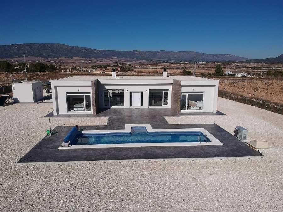 NEW BUILD VILLAS IN PINOSO&#13;&#13;You can choose Villas with traditional Spanish touches or super modern finishing, bright and clean. &#13;Different legal building plots available (rustic with minimum 10.000 m2), some walking distance to town, some totally private and our most popular ones are within 5-10 mins drive to a town. &#13;We have a plot for every taste, all with amazing views and all have mains water + electric included in the price and high speed internet available. &#13;From the biggest and best builder in the area and use top quality materials for a perfect finish. &#13;All houses include 2m stamped concrete terrace around the pool (colour and pattern to choose), 1m around the house, gated entrance, 3.000 m2 fencing, pre-installed ducted aircon, standard kitchen, security door, german tilt and turn windows (or sliding if prefered), built-in fireplace and chimney, pre-installation for tv and internet, gravel driveway plus a few meters around the house, septic tank. &#13;Bathrooms include a shower column, shower tray or bath, sink units (various colours to choose from) with sinks, taps and mirrors, plus a big selection of wall tiles. &#13;Wide selection of ceramic floor tiles, different colours, wood effect, etc. &#13;Kitchens include cabinets with standard doors and handles, as per plans provided, stainless steel sink and tap, pre-installation for oven, dishwasher, extractor. Various granite worktops to choose from included in the budget, other stone worktops available as extras. White goods not included. &#13;Marble staircase (cream, white, or grey) and railings included, plus railings for the front porch. &#13;Big fixed glass window on the staircase for extra light. &#13;Choice of tiles and steps design for swimming pool. Choice of the granite for the houses' exterior steps and window sils. &#13;You can customise the house to suit, most internal changes are free of charge, the houses can be extended and we can even build your own design. &#13;Upgrade to bigger pool, single or double garage, guest house, etc. at an extra cost.&#13;&#13;The beautiful and thriving town of Pinoso is approximately 45 minutes inland from Alicante and the white beaches of Costa Blanca and close to the Murcia, Alicante border&#13;&#13;It has a population of just under 8,000. Pinoso, also known as El Pinos is named after the pine trees that cover the areas mountain ranges. Pinoso provides a Spanish rural lifestyle, no traffic lights, hardly any traffic, practically the only jams are caused by the tractors taking the grapes to the Bodega. The fields are planted with vines, almonds and olives. In February the fields are filled with pink almond blossom.&#13;&#13;Pinoso has many bars, restaurants and shops, a new 24 hour medical centre, dentists, two primary schools and 1 secondary school, a theatre. There's an excellent Sports Centre with outdoor swimming pools, tennis courts, football pitches and gymnasium, library and many other facilities including a beautiful picnic area among the pines, complete with barbecues, seating areas and running water.&#13;