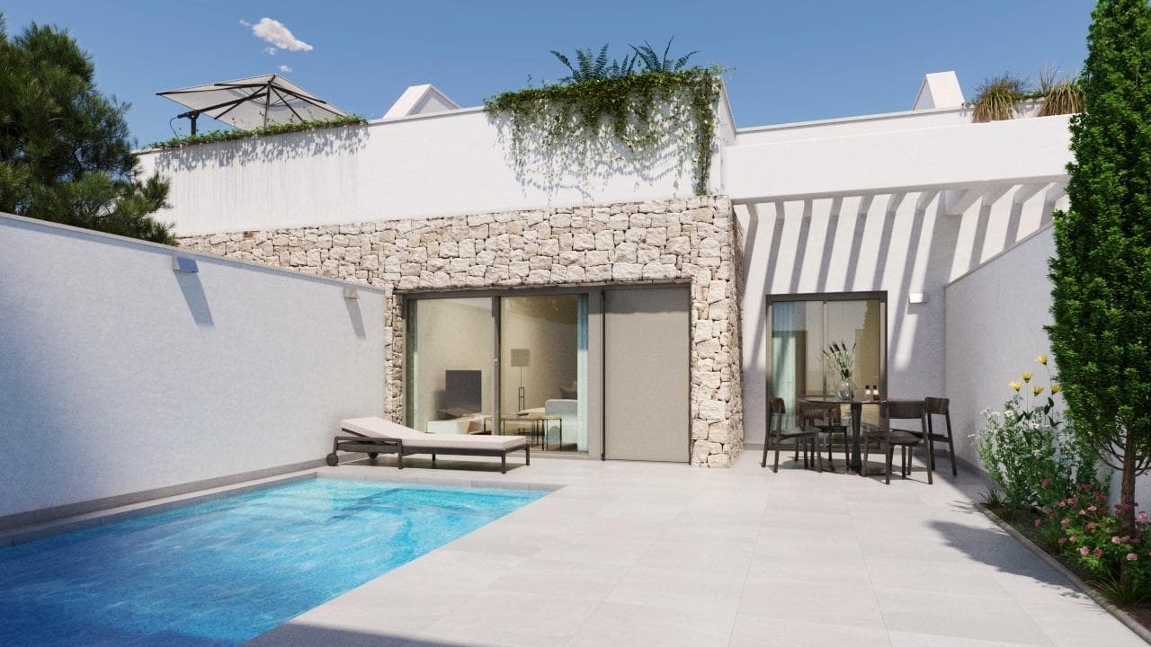 NEW BUILD TOWNHOUSES IN PILAR DE LA HORADADA&#13;&#13;New Build townhouses located in Pilar de la Horadada.&#13;&#13;Townhouses build on 1 floor and has private solarium, 3 bedrooms, 2 bathrooms, open plan kitchen with the living room, garden with parking space.&#13;&#13;An options for a private pool at an extra cost.&#13;&#13;Properties located a few meters from all services and the centre.&#13;&#13;Pilar de la Horadada is a typical Spanish village in the most southern part of the Costa Blanca.&#13;&#13;The large main street has supermarkets, lots of shops, restaurants and bars and some lovely squares.&#13;&#13;The beautiful beaches of Torre de la Horadada and Mil Palmeras with fine sand promenade is just 5 minutes away.&#13;&#13;In Pilar de la Horadada there is also a well-developed cycling and walking path network, and there is also a large offer of various sports activities.&#13;&#13;Lo Romero 18 hole golf course is just a short drive from town.&#13;The airports of Corvera (Murcia) and Alicante are respectively 40 and 55 minutes away.&#13;
