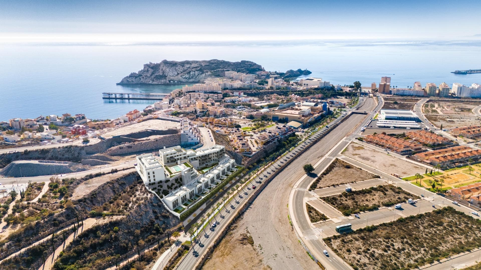 NEW BUILD RESIDENTIAL COMPLEX IN AGUILAS&#13;&#13;New Build exclusive residential complex of apartments and villas in Aguilas.&#13;&#13;New Build complex consist of 36 apartments with 3 and 2 bedrooms distributed in 4 modern blocks, equipped with 2 communal swimming pools and community garage with parking space and storage room for each property; and 10 elegant villas of 4 bedrooms and 3 bathrooms, each one with its own private pool. &#13;&#13;This residential complex has been designed with excellence in mind, offering spacious terraces on the ground and first floors and solariums on the upper floors, where the view of the horizon becomes a canvas of experiences.&#13;The houses have fully equipped kitchens and bathrooms and pre-installation for ducted air conditioning.&#13;&#13;Complex located 800 metres from the sea, next to a Shopping Centre.&#13;&#13;Aguilas located in exceptional area on Costa Cálida at only 50 minutes from the new Murcia or Almeria airport and 1h30 from Alicante airport.&#13;&#13;Aguilas it is a small city with many amenities, a long beach to walk and relax in the sun. Is a perfect enclave for diving, water sports, hiking and golf.&#13;&#13;It has 28 kilometers of coastline in which there are 35 beaches with different types of sand thickness located in different landscapes, from coves and virgin beaches in natural settings to the urban beaches of the town of Aguilas.&#13;Its warm desert climate is present all year round with an annual average of 22º with mild temperatures in winter and very hot in summer.&#13;
