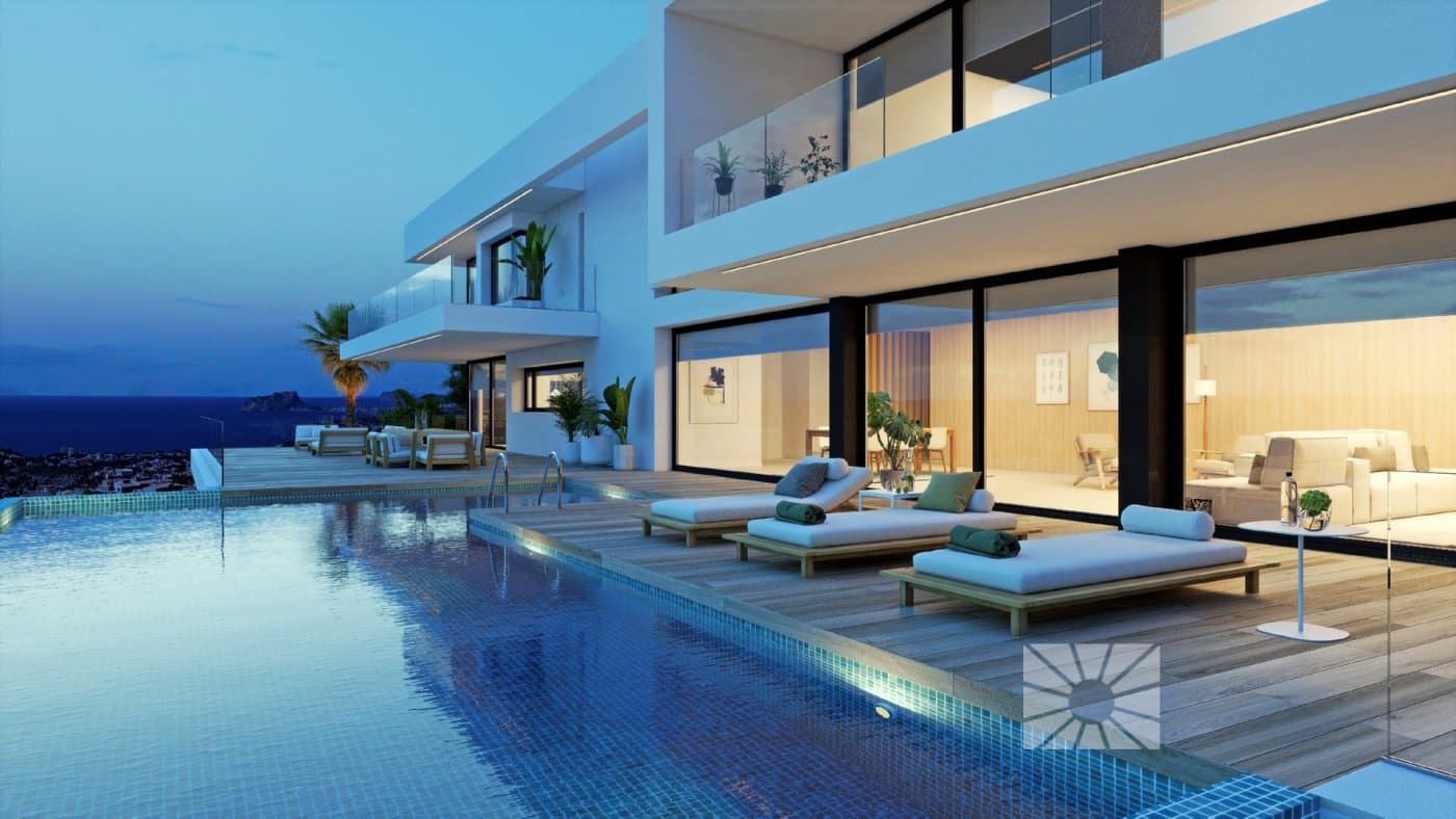 Exclusive property with independent and spacious spaces, designed exclusively on a plot of 2,000 square meters, has 4 bedrooms and 5 bathrooms and the possibility to expand in one more bedroom.
It has unique features, all rooms are spacious and bright and have their own bathroom. The master bedroom is completed with a dressing room, large terrace and an en suite bathroom with bathtub in which you can relax watching the sea. The day area is the ideal place for your guests, its spacious living room includes a dining area with sufficient capacity for a large family. This area has double height and the slats in the upper window give it brightness and greatness.
In the kitchen, where we find another dining room, the views are the protagonists thanks to the glazed walls that give it a pleasant warmth. Both the living room and the kitchen give access to an impressive terrace with solarium and chill out area that are completed with a large infinity pool with jacuzzi.
The lower floor surprises us with an extra space, which can be used for an apartment with room, bathroom, dining room, terrace and porch.
Covered parking for 3 cars, lift on 3 floors, which give it great comfort and functionality. In addition to extra spaces where you can design play or study areas, offices or even an extra lounge.
Included in the villa:

Private plot and fenced,
Garden,
Swimming pool,
Parking,
Decoration project with technical lighting,
Heating by underfloor heating,
Preinstallation Ducted air conditioning,
Kitchen equipped with appliances: Integrated combined refrigerator, Independent multi-function oven with timer, Independent Touchcontrol hob, Decorative hood, Microwave for free installation

Homes that enjoy all the services that a consolidated urbanization such as the Cumbre del Sol offers, with a shopping area with supermarket, hairdresser, pharmacy, bars and restaurants, Lady Elizabeth Junior School and a diverse range of sports with tennis and paddle courts, hiking trails, horse riding centre, beach and bays with beach bars.