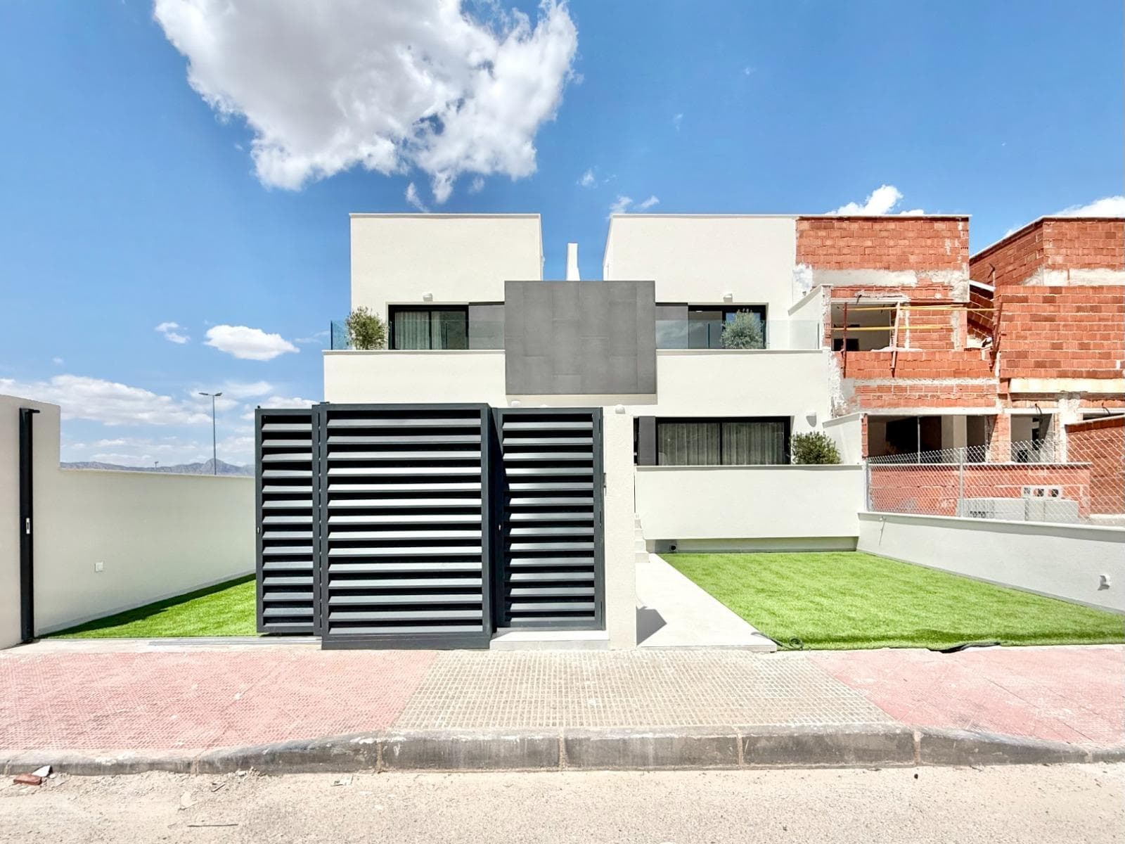 New Build Townhouses for Sale in Cox – 44 Modern Homes with Great Amenities&#13;&#13;Discover a new residential development of 44 modern townhouses in Cox, Alicante. These homes are available in 2- and 3-bedroom layouts, each featuring a private solarium, terraces, patios, and private parking. The community offers access to shared areas, including a communal swimming pool, creating an ideal environment for relaxation.&#13;&#13;Prime Location with Excellent Connectivity&#13;This development is located just 40 km from Alicante International Airport, making travel easy and convenient. Cox is well-connected to major cities: Orihuela is only 8 km away, Elche 20 km, Alicante 48 km, and Murcia 25 km. Golf enthusiasts will appreciate the nearby courses such as La Finca (12 km) and Vistabella (14 km).&#13;&#13;Easy Access to Major Roads&#13;Cox provides easy access to the AP-7 motorway and the Autovía del Mediterráneo (A-7), as well as local routes to surrounding areas such as Granja de Rocamora and Callosa de Segura. The town and surrounding areas boasts a population of over 35,000, offering a peaceful yet vibrant lifestyle.&#13;&#13;Local Amenities and Attractions&#13;Residents will enjoy a wide range of local amenities, including shops, schools, sports facilities, medical centers, and quick access to the beaches of the Costa Blanca, such as Guardamar del Segura and Torrevieja.&#13;&#13;Included Features&#13;Each home comes with a landscaped garden, LED lighting, electric shutters, solar panel pre-installation, fitted wardrobes, a security door, a fully equipped kitchen with Silestone countertops, and much more.&#13;