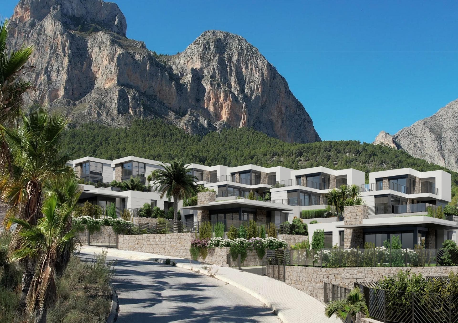 New Construction Villas in Polop, Alicante&#13;&#13;Modern Living Surrounded by Nature&#13;Discover this exclusive residential development of newly built villas in Polop, a charming inland village located in the province of Alicante. Just 10 km from Benidorm’s lively beaches and nightlife and close to the picturesque town of Altea, these homes offer an unbeatable combination of modern comfort and natural beauty.&#13;&#13;A Residential Development Tailored to Your Needs&#13;The project consists of 65 independent villas available in different layouts to suit your needs and budget. Choose between 3 or 4-bedroom homes, with options for single or two-story designs. Many of the properties are designed on a single level, providing enhanced accessibility and a comfortable living experience without the need for stairs.&#13;&#13;Each home is thoughtfully designed with spacious terraces, private gardens, and interior/exterior spaces where you can enjoy the Mediterranean climate. Optional private pools are also available to add an extra touch of luxury to your new home.&#13;&#13;Prime Location with Easy Access to Key Destinations&#13;Located in a peaceful natural setting, the development is ideal for those seeking tranquility without sacrificing convenience. The surrounding area offers access to key points of interest:&#13;&#13;Benidorm Beaches: 10 km (15-minute drive)&#13;Playa del Albir: 12 km (20 minutes), renowned for its pristine waters and scenic promenade&#13;Alicante Airport: 60 km (45 minutes)&#13;Villaitana Golf Course: 12 km (15 minutes)&#13;La Marina Shopping Center: 10 km (15 minutes)&#13;&#13;Premium Features for Modern Comfort&#13;Each villa is equipped with high-quality finishes and state-of-the-art systems, ensuring maximum comfort, security, and sustainability:&#13;Double-glazed PVC windows with thermal and solar insulation&#13;Reinforced front doors for enhanced security&#13;Fully equipped kitchens with induction hob, oven, extractor hood, and stainless-steel sink&#13;Modern bathrooms with stylish porcelain sinks and fittings&#13;Pre-installed ducted air conditioning with heat pump&#13;Hot water supplied via aerothermal systems for energy efficiency&#13;Gated community with perimeter surveillance cameras&#13;&#13;Polop: The Perfect Blend of History and Nature&#13;Polop de la Marina is a historic town surrounded by stunning landscapes. Its charming old town, the Gabriel Miró House-Museum, and various hiking trails make it a sought-after destination for nature and history enthusiasts.&#13;&#13;Experience Coastal and Countryside Living&#13;Embrace a new lifestyle in these carefully designed homes, where comfort meets nature. Enjoy the panoramic views through large windows that frame the surrounding landscape, creating the perfect balance between indoor and outdoor living.&#13;&#13;Don’t miss the opportunity to own your dream home in Polop! Contact us today for more information and to schedule a visit.&#13;