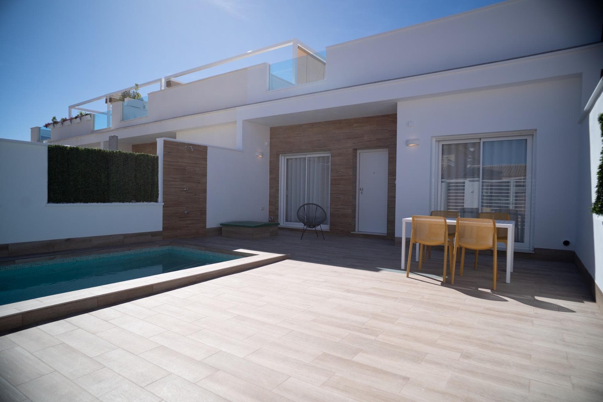 NEW BUILD TOWNHOUSES IN SAN JAVIER New Build luxury complex of 24 one level villas or on 2 floors with private pool, terraced area and solarium with Summer kitchen that allows you to enjoy all hours of sunshine, every day of the year. Each villa has 2 or 3 bedrooms and 2 fitted bathrooms on one level or 3 bedrooms and 3 fitted bathrooms on two levels.  Designed with a contemporary style and open planned concept, comprising a fully-fitted kitchen and lounge-dining room. The development is located in San Javier (Murcia), near the beach, surrounded by services, parks, sports facilities and several Golf Courses. The property will meet the highest standards and will be equipped with: Private swimming pool with shower. Kitchen completely furnished and equipped with oven, microwave, fridge, integrated dishwasher, hob and extractor fan. Lighting: inside the property (dining room, kitchen, corridors and bathrooms) as well as in outdoor areas. Lined wardrobes with drawers. Fully fitted bathrooms with toilet, vanity unit, mirror and shower with screen panels. Pre-installation for ducted air conditioning. Solarium with Summer kitchen. Parking space on the plot. San Javier is close to all amenities with easy access to the beach, water sports, shops and the transport network. Here you can enjoy all of the facilities that San Javier has to offer such as the local shops, bars and restaurants as well as being near to shopping centres, the airport of Murcia and all of the beautiful places to be found along the Mar Menor.  Corvera/Murcia airport is 30 minutes away and Alicante airport is 45 minutes away.