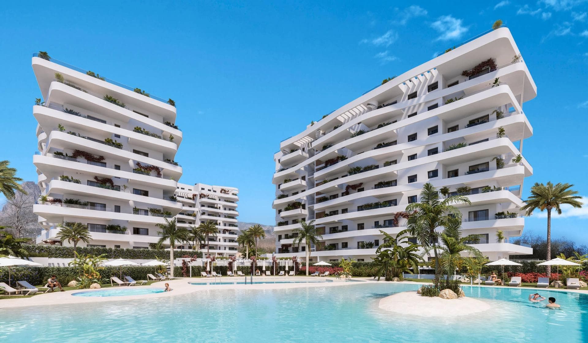 Luxury Resort in Villajoyosa – A Seaside Paradise

Discover a Unique Residential Complex in Playa del Torres
Located less than a 5-minute walk from the serene Playa del Torres in Villajoyosa, this exclusive new development offers 164 modern apartments and penthouses with 1 to 3 bedrooms. Designed to provide the ultimate lifestyle, the community combines luxury, relaxation, and unparalleled amenities in a tranquil Mediterranean setting.

Exceptional Amenities for All Residents
The heart of this development is the Roof Top, situated on the rooftop of Block 2. This thoughtfully designed space includes a stunning pool with panoramic views, Chill-out areas, a barbecue zone, a multi-use area, and a gazebo, perfect for socializing or unwinding.
Indoor social lounge, ideal for gourmet dining with friends or as a coworking space.
For water lovers, the complex features:
Tropical-style pools with beach-style access.
A heated swimming lane pool, a children’s pool, and a heated jacuzzi.
Fitness enthusiasts can enjoy:
Indoor and outdoor gyms, complete with a calisthenics circuit.
A putting green and mini golf for leisure activities.

Modern Homes with Premium Features
Each apartment is equipped with:
A fully fitted kitchen with high-quality appliances, including a refrigerator, microwave, oven, dishwasher, and an integrated washer/dryer.
Energy-efficient aerothermal systems for hot water and air conditioning.
Radiant floor heating in bathrooms.
High-quality PVC windows with thermal insulation and double glazing.
Private parking and storage space for added convenience.
The building boasts an A energy rating, ensuring maximum efficiency and sustainability.

Perfect Location in Villajoyosa
Nestled in Playa del Torres, this complex offers a peaceful retreat surrounded by natural beauty. The beach’s crystal-clear waters and turquoise hues provide an idyllic backdrop for relaxation. The development is conveniently located:
2 km from Villajoyosa’s charming town center.
10 km from Benidorm, with its vibrant nightlife and shopping.
30 minutes by car to Alicante Airport.

Villajoyosa, known for its colorful houses and rich history, remains an authentic Mediterranean gem. Recently recognized as the “Best Secret Destination in Europe 2024” by European Best Destinations, this town blends tradition, natural beauty, and tranquility.

Your Dream Home Awaits in Playa del Torres
Experience the best of modern living in a natural paradise. With its prime location, luxurious amenities, and contemporary design, this development is perfect for those seeking a home by the sea. Contact us today to schedule a visit and make this stunning property yours!