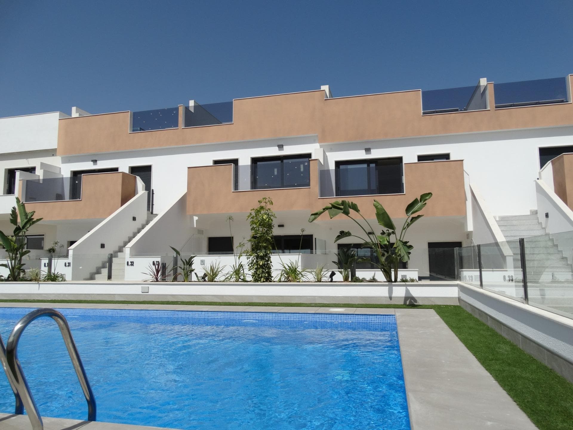 Newly Built Bungalows with Solarium or Garden in Pilar de la Horadada&#13;&#13;Modern Residential Development on the Southern Costa Blanca&#13;Located in the charming municipality of Pilar de la Horadada, this new residential development of bungalows offers a comfortable, Mediterranean lifestyle in one of the most attractive areas of the Costa Blanca. Pilar de la Horadada is known for its welcoming atmosphere, excellent climate and extensive sandy beaches such as Las Higuericas and Mil Palmeras, ideal for enjoying with the family or practising water sports.&#13;&#13;Layout and Types of Properties&#13;The complex consists of 28 modern bungalows available in 2 and 3 bedroom versions, distributed as follows:&#13;&#13;Ground floors with private garden&#13;Upper floors with private solarium and assigned storage room&#13;&#13;Many of the properties are south-facing, ensuring excellent natural light, and offer views of the communal pool or the adjacent park.&#13;&#13;Functional and well-equipped spaces&#13;Each property has been designed with spacious and functional spaces:&#13;&#13;Open-plan kitchen with large living-dining room&#13;Built-in wardrobes&#13;Private terrace in each unit&#13;Parking space included&#13;&#13;In addition, the properties feature:&#13;&#13;Hot water via aerothermal system&#13;Pre-installation of air conditioning&#13;PVC exterior carpentry with double glazing and aluminium shutters&#13;Bathroom furniture included&#13;&#13;Communal Areas and Natural Environment&#13;The residential complex includes a communal swimming pool surrounded by green areas, perfect for enjoying the sun and tranquillity. Just 4 km from Las Higuericas Beach, it can be easily reached on foot or by bike along the pleasant promenade that connects to the sea.&#13;&#13;Excellent location and connectivity&#13;The location of the residential complex allows access to all kinds of services and points of interest:&#13;&#13;Supermarkets, shops, bars and restaurants less than 1 km away&#13;Golf courses such as Lo Romero 6 km away&#13;Dos Mares shopping centre 11 km away&#13;Mil Palmeras and Torre de la Horadada beaches just 5 minutes away&#13;Murcia (Corvera) airport 40 km away&#13;Alicante Airport 65 km away&#13;&#13;Your New Life in the Sun&#13;This residential development in Pilar de la Horadada represents an excellent opportunity to enjoy Mediterranean living in a modern and well-located property.&#13;&#13;Contact us today for more information or to arrange a viewing and take the first step towards your new home on the Costa Blanca.&#13;