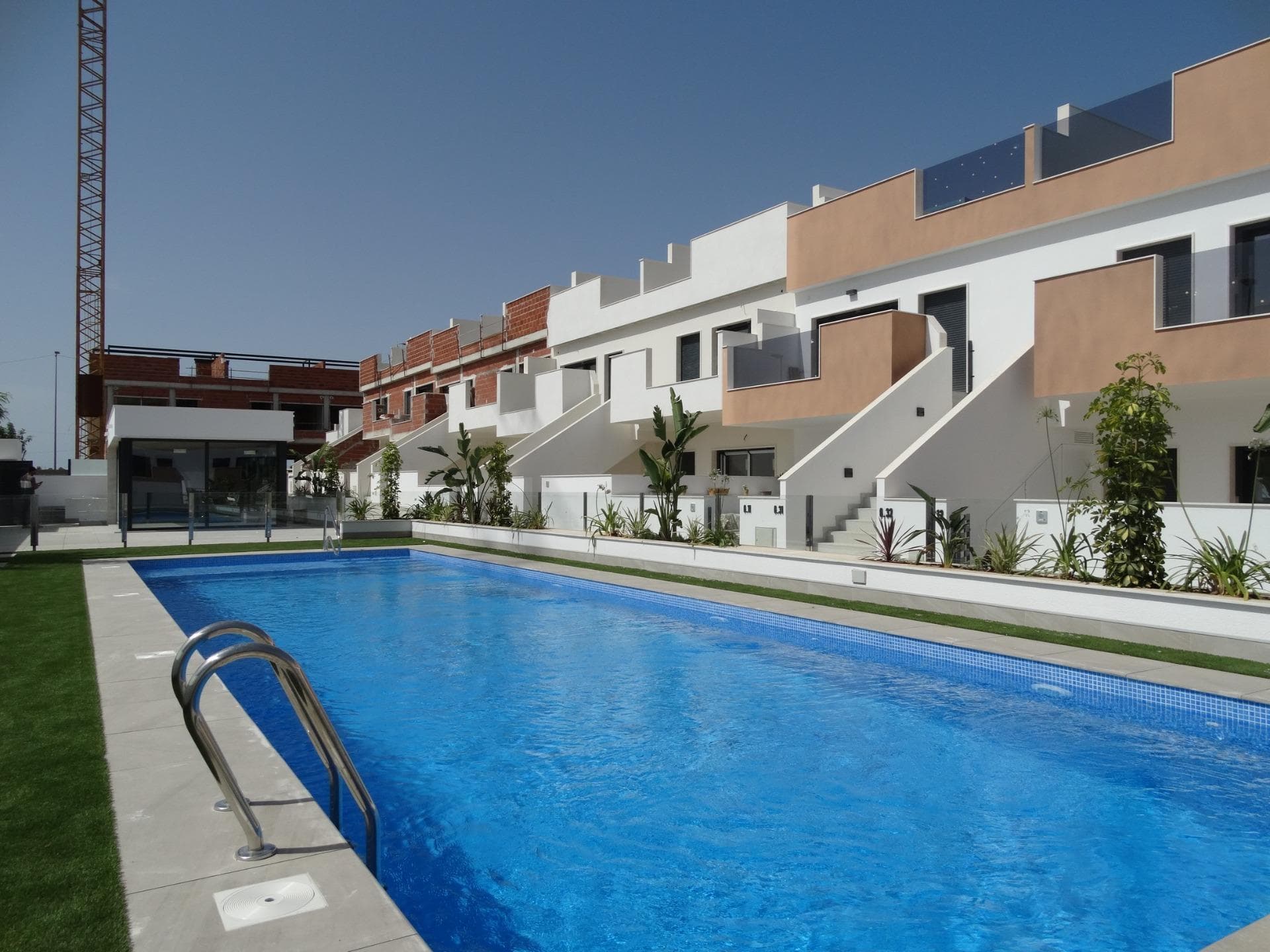 Newly Built Bungalows with Solarium or Garden in Pilar de la Horadada&#13;&#13;Modern Residential Development on the Southern Costa Blanca&#13;Located in the charming municipality of Pilar de la Horadada, this new residential development of bungalows offers a comfortable, Mediterranean lifestyle in one of the most attractive areas of the Costa Blanca. Pilar de la Horadada is known for its welcoming atmosphere, excellent climate and extensive sandy beaches such as Las Higuericas and Mil Palmeras, ideal for enjoying with the family or practising water sports.&#13;&#13;Layout and Types of Properties&#13;The complex consists of 28 modern bungalows available in 2 and 3 bedroom versions, distributed as follows:&#13;&#13;Ground floors with private garden&#13;Upper floors with private solarium and assigned storage room&#13;&#13;Many of the properties are south-facing, ensuring excellent natural light, and offer views of the communal pool or the adjacent park.&#13;&#13;Functional and well-equipped spaces&#13;Each property has been designed with spacious and functional spaces:&#13;&#13;Open-plan kitchen with large living-dining room&#13;Built-in wardrobes&#13;Private terrace in each unit&#13;Parking space included&#13;&#13;In addition, the properties feature:&#13;&#13;Hot water via aerothermal system&#13;Pre-installation of air conditioning&#13;PVC exterior carpentry with double glazing and aluminium shutters&#13;Bathroom furniture included&#13;&#13;Communal Areas and Natural Environment&#13;The residential complex includes a communal swimming pool surrounded by green areas, perfect for enjoying the sun and tranquillity. Just 4 km from Las Higuericas Beach, it can be easily reached on foot or by bike along the pleasant promenade that connects to the sea.&#13;&#13;Excellent location and connectivity&#13;The location of the residential complex allows access to all kinds of services and points of interest:&#13;&#13;Supermarkets, shops, bars and restaurants less than 1 km away&#13;Golf courses such as Lo Romero 6 km away&#13;Dos Mares shopping centre 11 km away&#13;Mil Palmeras and Torre de la Horadada beaches just 5 minutes away&#13;Murcia (Corvera) airport 40 km away&#13;Alicante Airport 65 km away&#13;&#13;Your New Life in the Sun&#13;This residential development in Pilar de la Horadada represents an excellent opportunity to enjoy Mediterranean living in a modern and well-located property.&#13;&#13;Contact us today for more information or to arrange a viewing and take the first step towards your new home on the Costa Blanca.&#13;