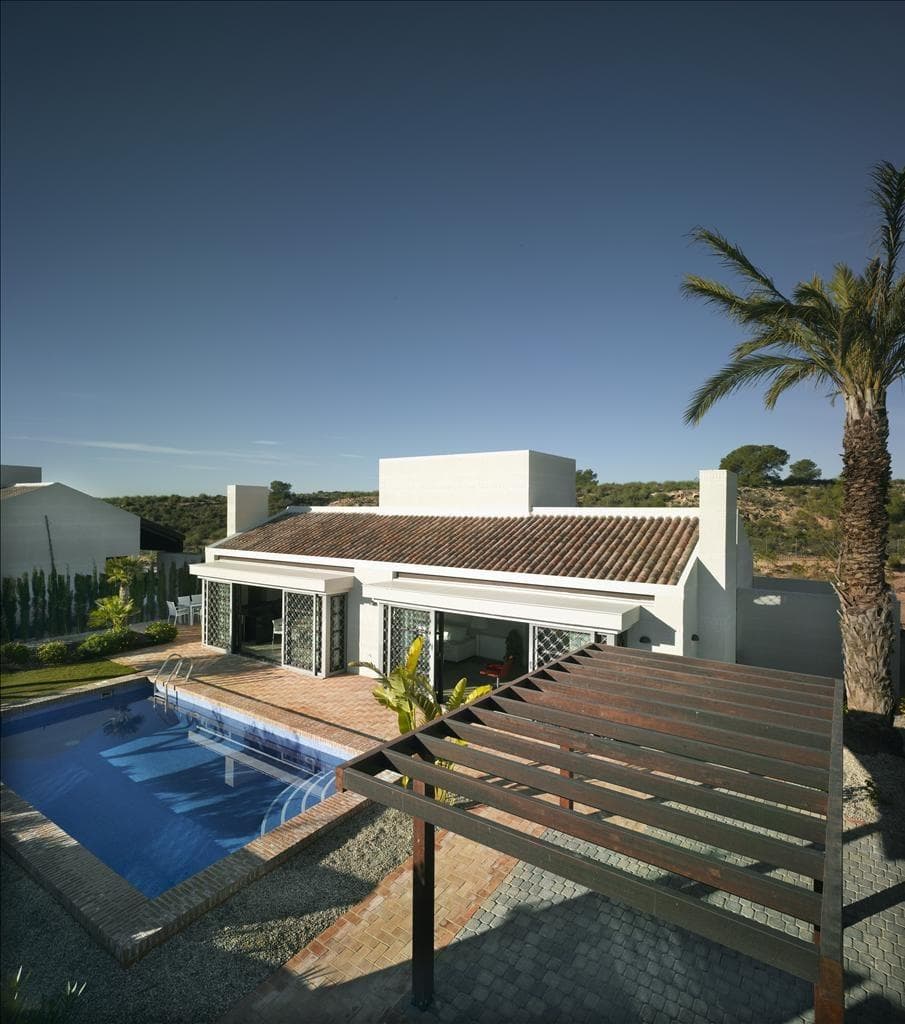 Elegant detached villas with private pool at Peraleja Golf Resort - Costa Cálida&#13;&#13;Mediterranean-style detached houses in a gated golf community&#13;&#13;20 detached villas with 6 models to choose from with 2, 3 or 4 bedrooms and 1, 2 or 3 floors on plots ranging from 375 to 800 m2. Some units have a rooftop solarium.&#13;&#13;Located in the prestigious Peraleja Golf Resort, in the Murcia region of southern Spain. These modern Mediterranean homes are set on spacious plots, each with a private pool, garden and parking. Designed with sloping roofs and natural materials such as wood and stone, these homes blend seamlessly into the surrounding landscape, while offering elegant and timeless interiors.&#13;&#13;Comfortable living with top-quality finishes&#13;Each house features:&#13;&#13;Fully fitted open-plan kitchen with appliances&#13;Bright living/dining room with a cosy wood-burning fireplace&#13;Central air conditioning and gas-fired radiator heating&#13;Secure entrance door and motorised access gate for vehicles&#13;Private swimming pool (3.5x5.5 m) with outdoor shower&#13;Outdoor water points and lighting&#13;Fully landscaped garden ready to enjoy&#13;&#13;These properties have been carefully designed by a renowned architect, combining elegant lines with natural textures, creating a unique and harmonious environment within a secure gated community.&#13;&#13;Life at Peraleja Golf Resort - Nature and security&#13;The houses are located within Peraleja Golf Resort, which has a 24-hour security gate, piano bar and clubhouse with gourmet restaurant. The complex is surrounded by protected natural areas where hiking, jogging and cycling trails are being developed for residents. The 18-hole golf course, originally designed by the legendary Severiano Ballesteros, is currently being renovated and is scheduled to reopen in late 2025. Some homes and the social club enjoy distant sea views.&#13;&#13;Convenient location close to beaches and towns&#13;This peaceful complex offers excellent access to key locations:&#13;&#13;Towns of Sucina and Avileses - 3-5 km&#13;Mar Menor beaches - 20 km (20 min by car)&#13;City of Murcia - 25 km (20 min by car)&#13;Murcia Airport (RMU) - 25 km (15 min by car)&#13;Alicante Airport (ALC) - 80 km (45 min by car)&#13;La Zenia Boulevard Shopping Centre - 35 km&#13;&#13;Enjoy the charm of the Costa Cálida&#13;Located near the traditional Spanish town of Sucina, residents can enjoy local shops, restaurants and authentic charm, while still being close to the coast and vibrant city life. This area has become increasingly popular with international buyers for its quality of life, good infrastructure, wonderful year-round climate and access to natural landscapes and the sea.&#13;&#13;Contact us today to secure your dream villa in Peraleja Golf and start enjoying life on the Costa Cálida.&#13;