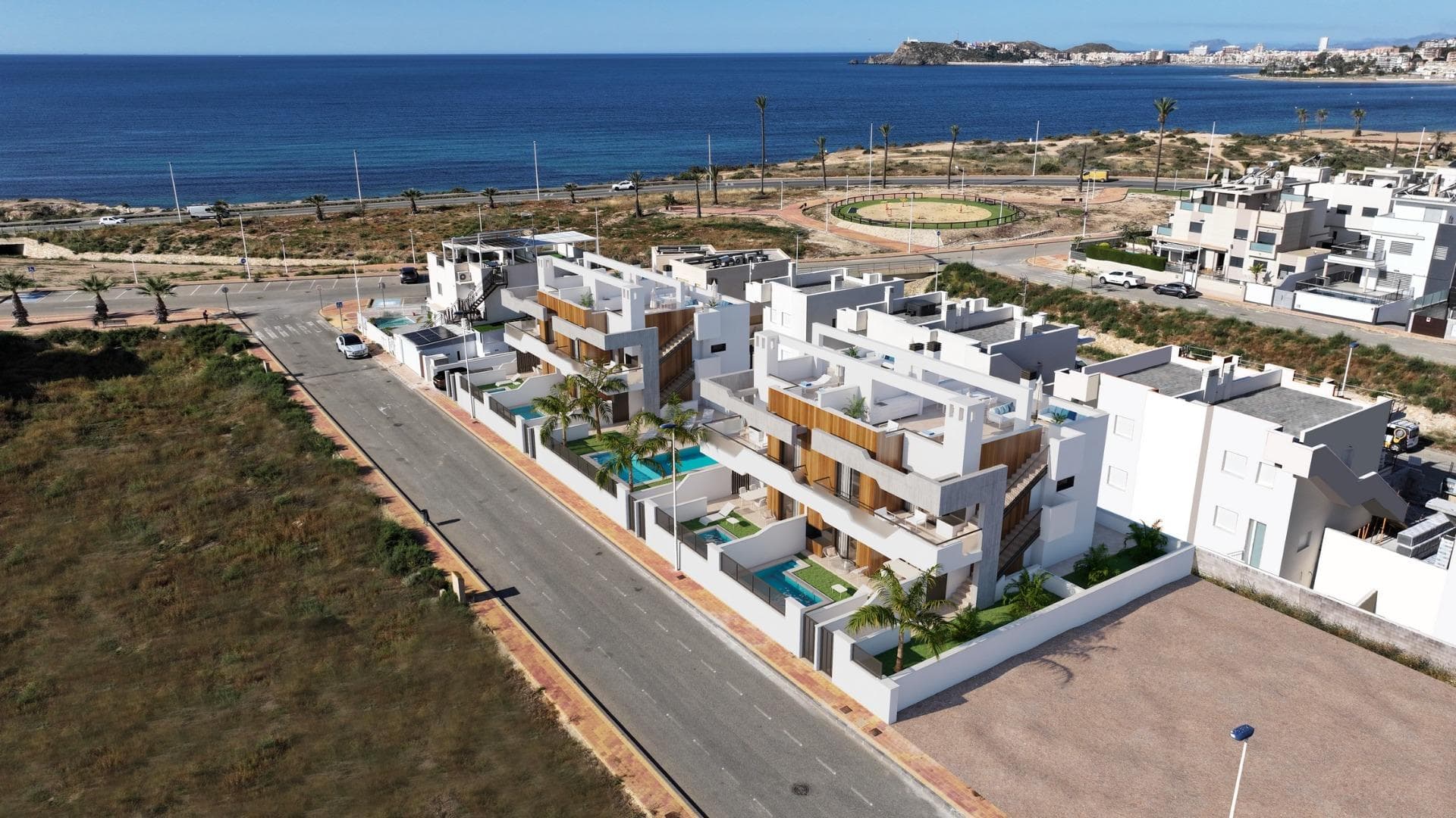 New-Build Homes Just 150 Meters from the Beach in Puerto de Mazarrón&#13;&#13;Exclusive Residential Project Near Playa Negra&#13;&#13;Discover this boutique development of just 8 modern homes located only 150 meters from Playa Negra in Puerto de Mazarrón, Murcia. This new construction project offers the perfect blend of coastal living, privacy, and contemporary comfort, ideal for both year-round living and holiday retreats.&#13;&#13;Enjoy sea views, a peaceful environment, and easy access to one of the most beautiful beach areas on the Costa Cálida. The development is situated in a quiet residential area with all essential services nearby, including supermarkets, restaurants, schools, and medical centers.&#13;&#13;Property Types and Layouts&#13;&#13;The development offers a choice of ground-floor or top-floor homes:&#13;&#13;Ground-floor units: 3 bedrooms and 2 bathrooms with private gardens. Optional private pool available at an extra cost.&#13;Top-floor units: 2 bedrooms and 2 bathrooms with large terraces and private rooftop solariums, perfect for sunbathing and outdoor dining.&#13;All properties include a storage room and an allocated parking space in the underground garage.&#13;&#13;Modern Features and High-Quality Finishes&#13;These newly built homes are designed with high-end materials and thoughtful details to enhance comfort and efficiency:&#13;PVC exterior carpentry with double glazing and air chamber for insulation&#13;Reinforced security entrance door&#13;Electric underfloor heating in bathrooms&#13;Fully equipped kitchens with appliances included&#13;Ducted air conditioning system installed&#13;Communal pool with landscaped garden&#13;Preinstallation for satellite TV&#13;&#13;Prime Location in Puerto de Mazarrón&#13;&#13;Puerto de Mazarrón is one of the most sought-after coastal destinations in the Murcia region, known for its picturesque beaches, vibrant marina, and relaxed Mediterranean atmosphere. The area offers a wide range of outdoor activities, from sailing and scuba diving to hiking and cycling in the nearby Sierra de las Moreras.&#13;&#13;Distances to key points of interest:&#13;Playa Negra: 150 meters&#13;Mazarrón Marina: 2 km&#13;Cartagena: 35 km&#13;Murcia city: 70 km&#13;Corvera Airport (Murcia): 45 km&#13;Golf courses (Camposol, Hacienda del Álamo): 25–35 km&#13;Shopping center Mazarrón Park: 5 km&#13;&#13;Make the Coast Your New Home&#13;&#13;Don’t miss this rare opportunity to own a brand-new home near the beach in Puerto de Mazarrón. Contact us today to learn more or schedule a visit to see the available units and experience the Mediterranean lifestyle first-hand.&#13;