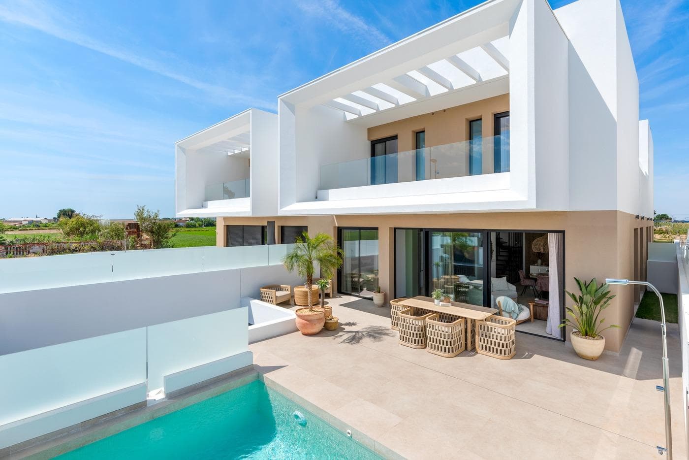 New Build Semi-Detached and Terraced Villas in Dolores, AlicanteDiscover this exclusive new development of 20 modern semi-detached and terraced villas in Dolores, a charming town located in the heart of the Vega Baja region, in the province of Alicante. Surrounded by orchards and natural beauty, Dolores offers a peaceful lifestyle just a short drive from the Mediterranean coast.Contemporary Villas with Private PoolsEach home in this new development is thoughtfully designed over two floors and features:3 spacious bedrooms2 full bathrooms and 1 guest toiletOpen-plan kitchen with island, furnished and equipped with appliancesBright living-dining area with direct access to the terracePrivate garden with swimming pool, filtration system, and LED lightingOn-site parking within the plotThese villas combine functionality and style, offering everything needed for modern Mediterranean living.High-Efficiency Features and Modern ComfortsBuilt to the highest standards, the homes include:Ducted air conditioning installation on both floors250-liter aerothermal water heating systemElectric underfloor heating in bathroomsMotorized blindsLED lighting throughout the interior and exterior3kW photovoltaic solar panels for improved energy efficiencyThese features ensure a sustainable and comfortable home environment year-round.Ideal Location Near the Coast and AmenitiesDolores is a well-connected and growing town just 12 km from the stunning beaches of La Marina and Guardamar del Segura. The area offers essential services including shops, restaurants, schools, and health centers. It also maintains a tranquil, residential atmosphere ideal for families and retirees.Distances to main points of interest:La Marina Beach – 12 kmGuardamar del Segura – 14 kmAlicante Airport – 30 kmMurcia-Corvera Airport – 85 kmLa Marquesa Golf (Ciudad Quesada) – 13 kmTorrevieja – 25 kmYour New Home Awaits in DoloresWhether you're looking for a permanent residence, a holiday retreat, or an investment in the Costa Blanca, these new villas in Dolores are a perfect choice. Contact us today for more information or to schedule a viewing.